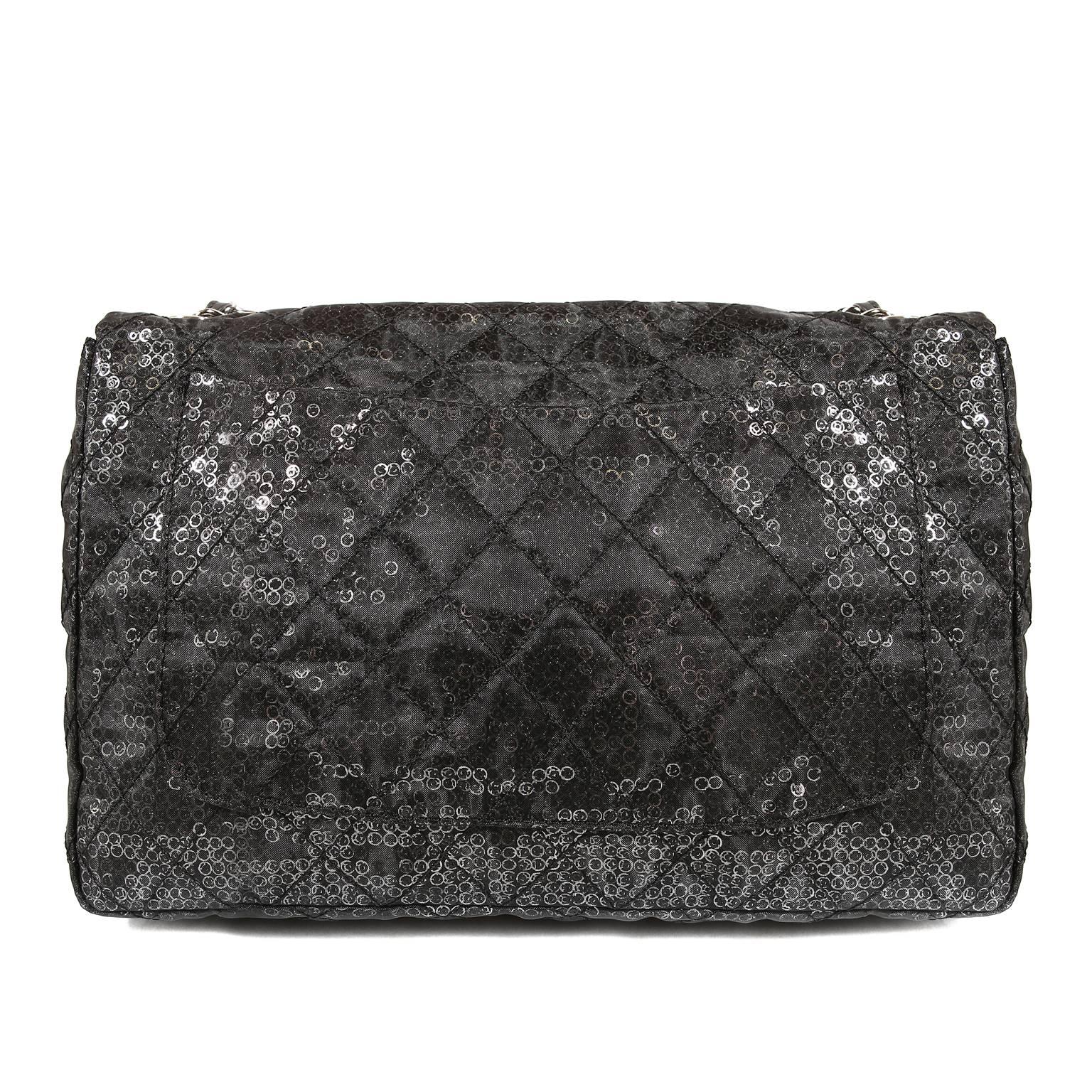 Chanel Hidden Sequins Jumbo Classic Flap Bag- Pristine, Unworn Condition. Special Edition.
The classic silhouette is texturally and visually unique; an imperative acquisition for collectors. 
Black mesh fabric is quilted in signature Chanel diamond