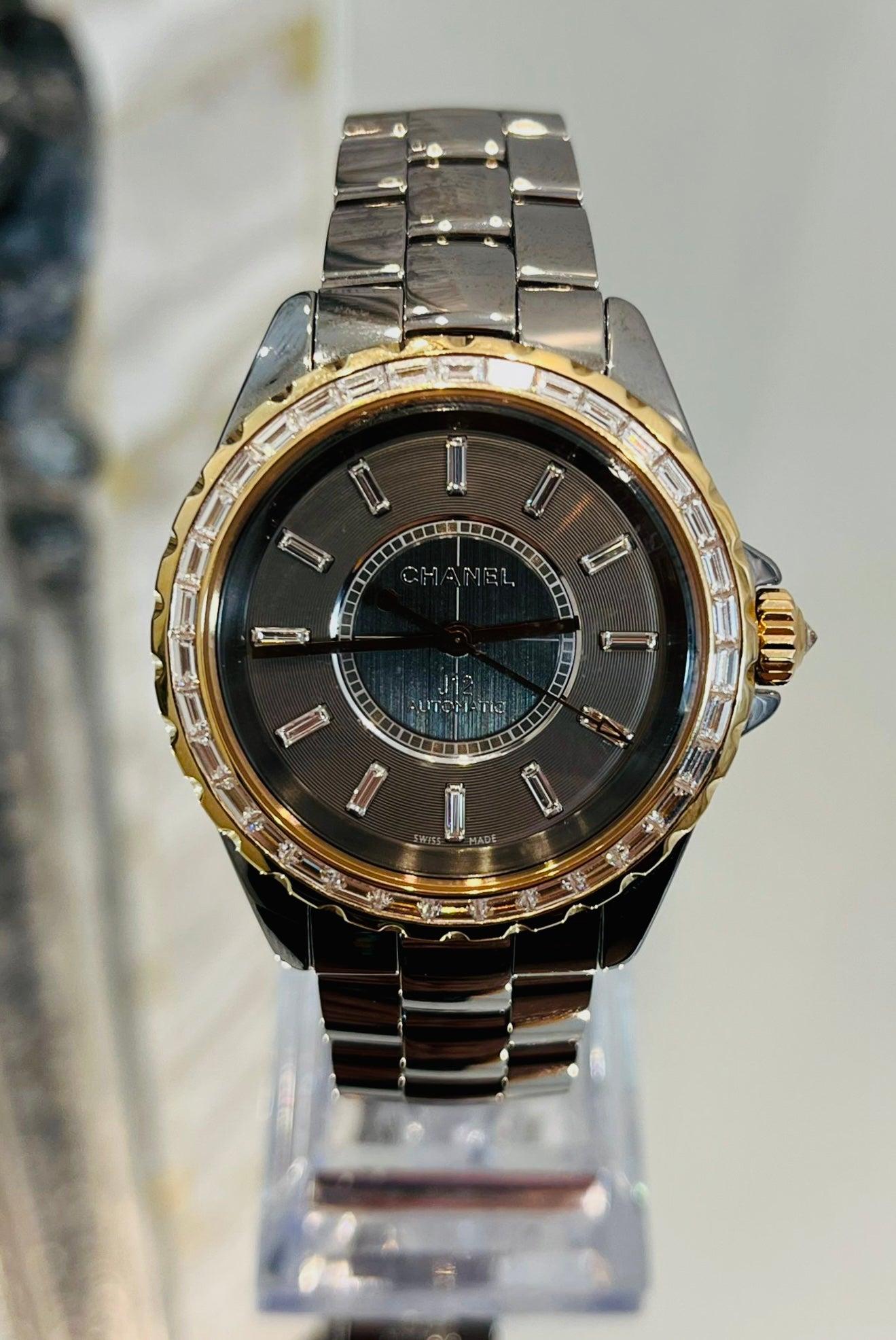 Chanel High End Jewellery Collection Baguette Diamond J12 Automatic Watch

Chromatic coloured, titanium ceramic watch with 18k Rose gold trim to the bezel and further set with 34 beautiful white baguette diamonds. Baguette diamond hour