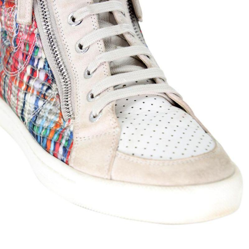 Chanel High Top Zip 36 Tweed CC Mother of Pearl Sneakers CC-0502N-0147

These Chanel High Tops Sneakers are a must! Coated fabric uppers, silvertone zippers, pearl with 