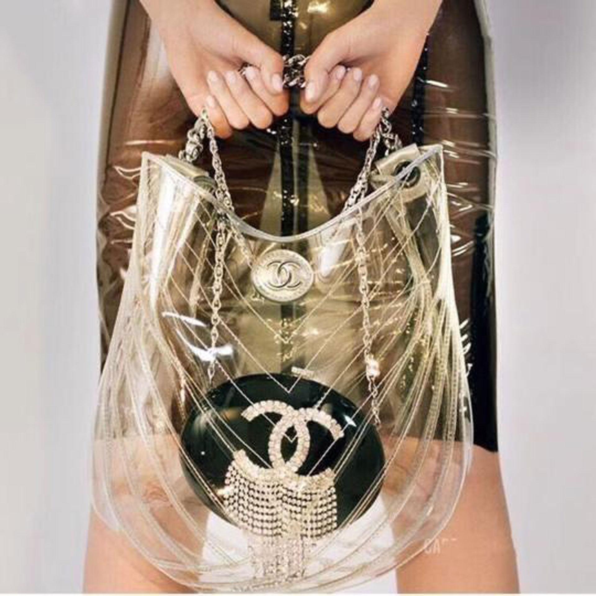 Chanel 2018 stunning runway teardrop hobo bag with silver and glazed calfskin leather

Limited edition transparent bag comes with box, dust bag, and authenticity card. 

Sold-out everywhere! 

Made in France.

