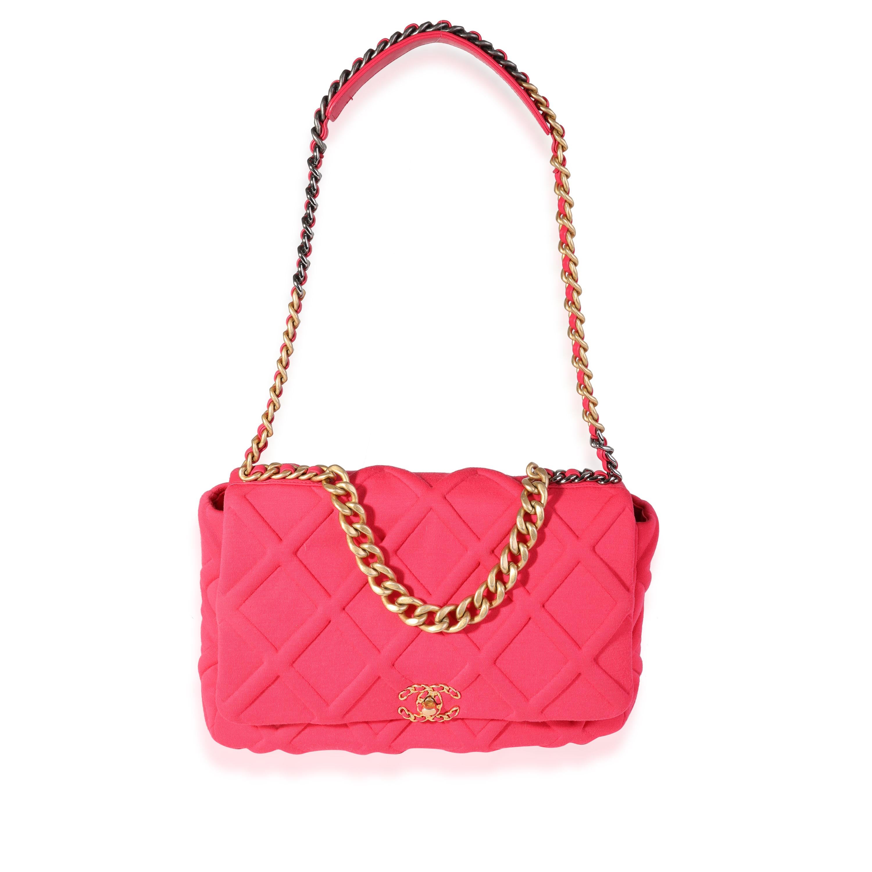 Listing Title: Chanel Hot Pink Quilted Jersey Large Chanel 19 Flap Bag
SKU: 120694
Condition: Pre-owned 
Handbag Condition: Excellent
Condition Comments: Excellent Condition. Light pilling to exterior. No other visible signs of wear.
Brand: