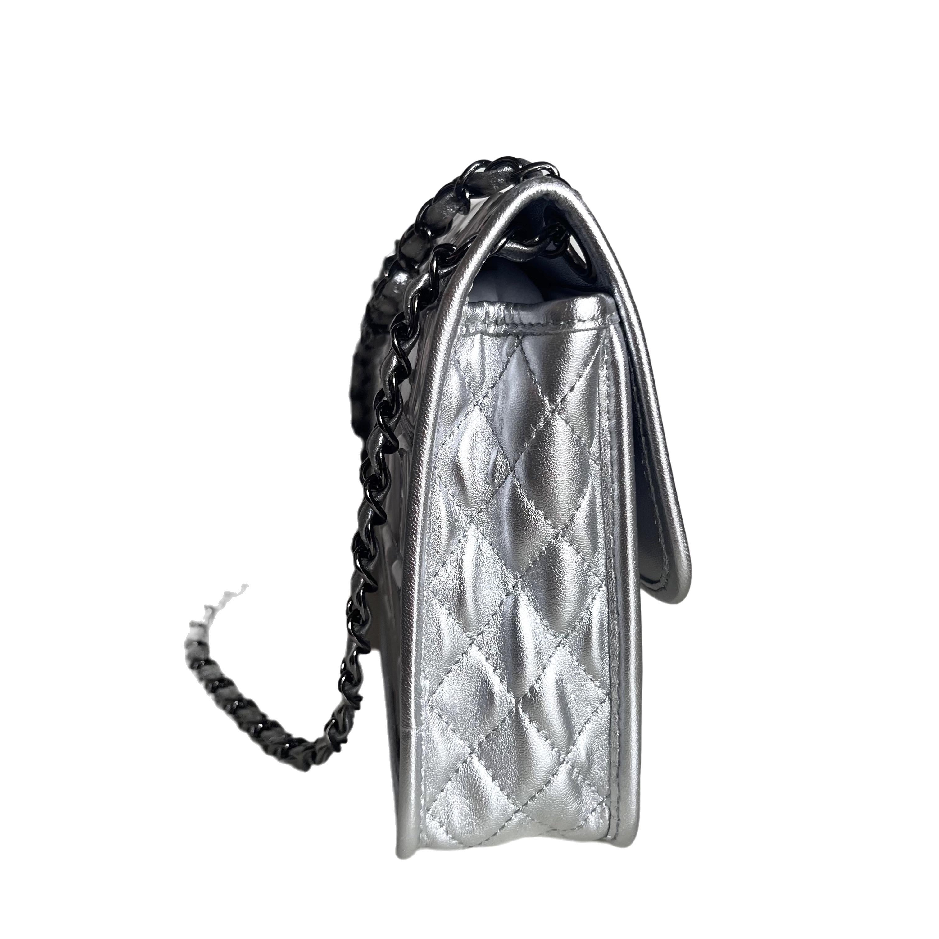 This charming collectible and highly sought after Chanel Ice Cube 2006-2008 is a stylish mix of classy and casual. Featuring a chain and leather strap, foldover top with twist-lock closure, and a square quilted finish, this bag is crafted from