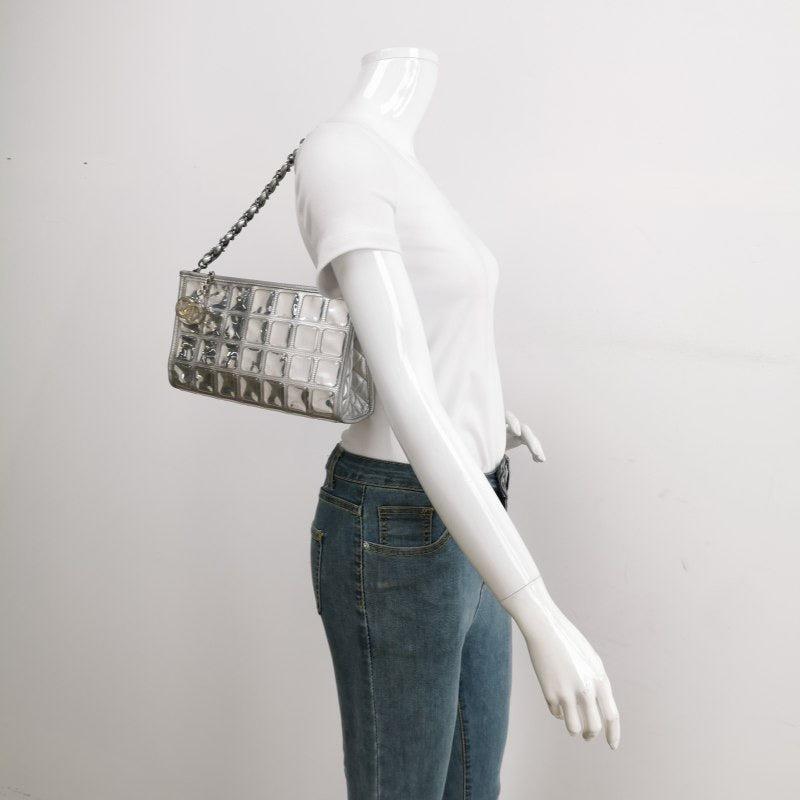 Chanel Ice Cube Chocolate Bar Clutch Metallic Silver PVC with Leather Shoulder Bag
These are professional photos of the actual bag.
  This charming collectible and highly sought after Chanel Ice Cube 2006-2008 is a stylish mix of classy and casual.