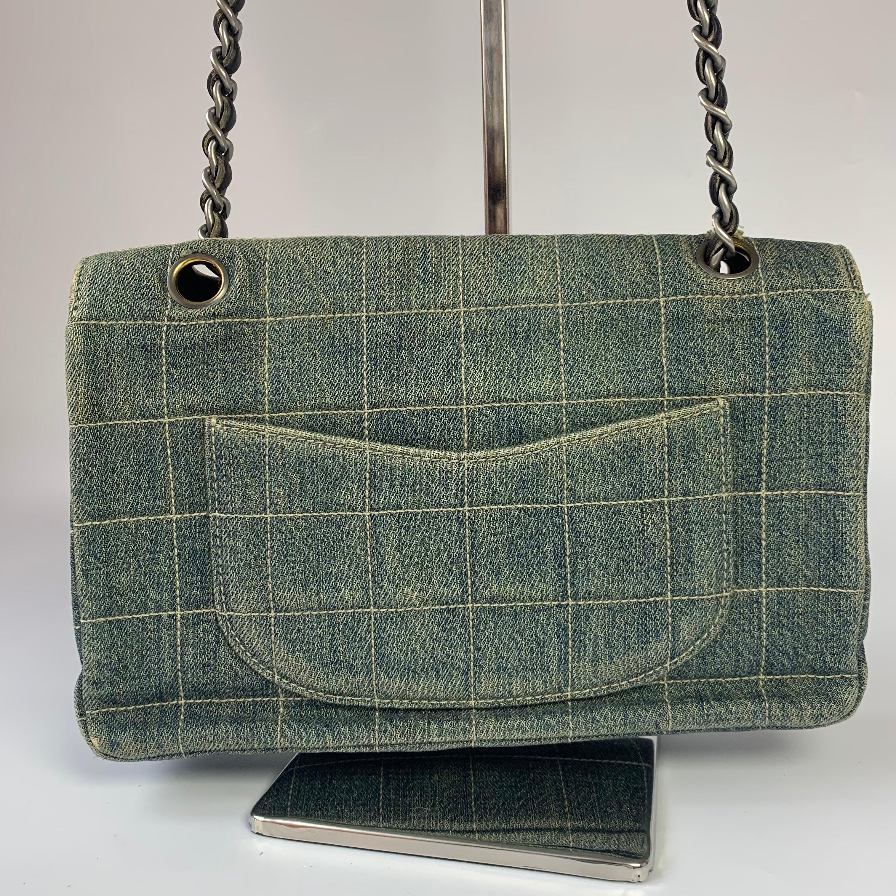 Chanel Ice Cube Chocolate Bar Medium Classic Flap Denim Green
These are professional photos of the actual bag.
  This effortlessly chic Chanel Ice Cube 2006-2008 is a stylish mix of classy and casual. Featuring a chain and leather strap, foldover