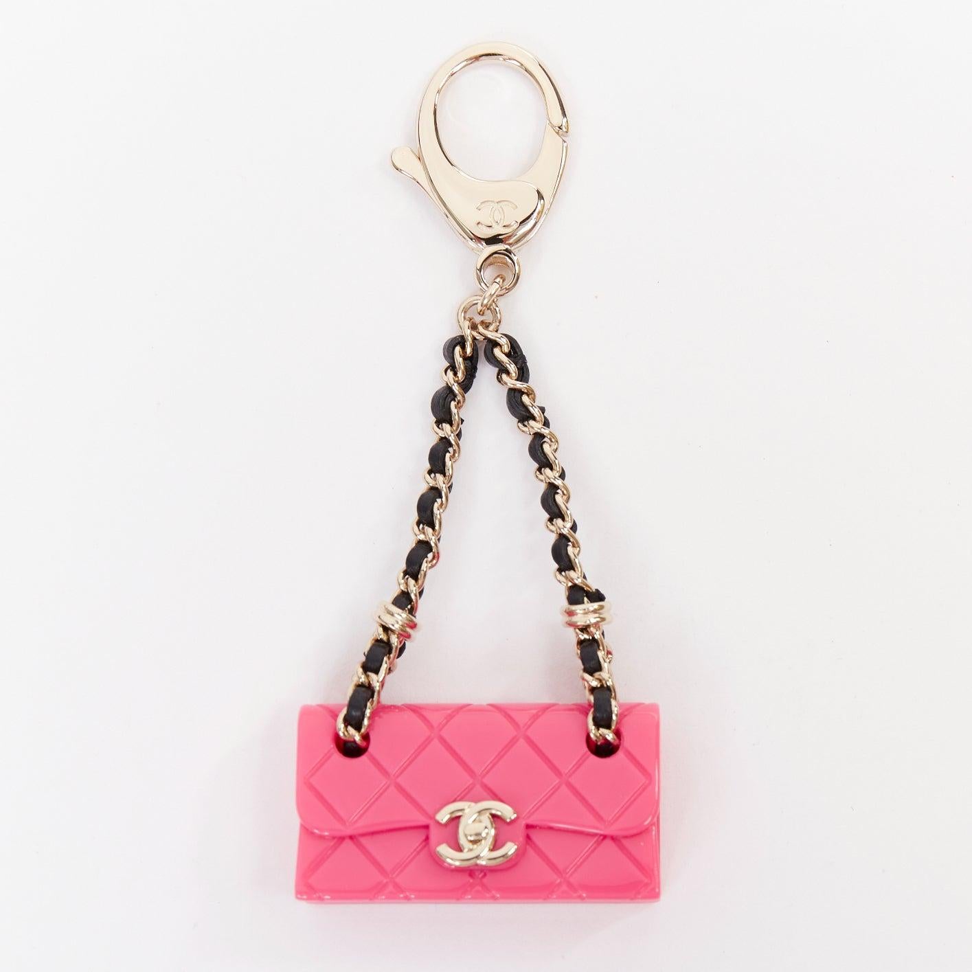 CHANEL Icon hot pink mini flap bag gold CC logo chain lobster clasp charm