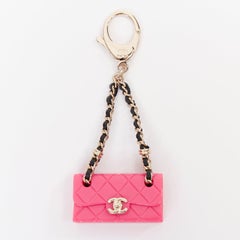 CHANEL Icon hot pink mini flap bag gold CC logo chain lobster clasp charm