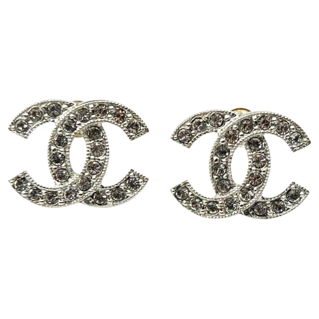 Chanel Iconic Classic Silver CC Crystal Reissued Stud Medium Piercing Earrings   For Sale