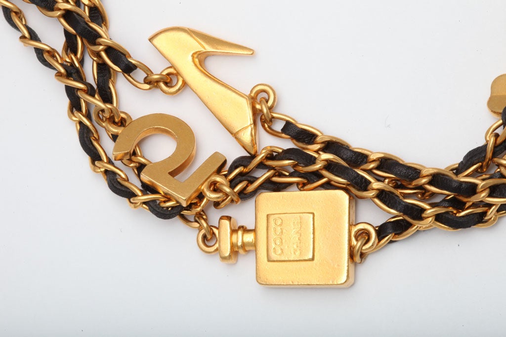 Women's Chanel Iconic Motif Charm and Leather Long Necklace For Sale