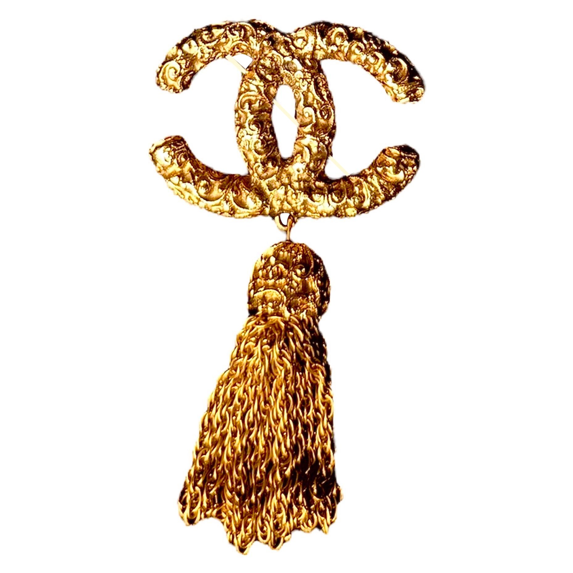 Chanel IconicSpilla placcata oro con logo CC e nappina *RARA* 1993 in vendita