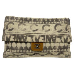 Chanel Iliad Logo Printed Canvas Oversized Clutch