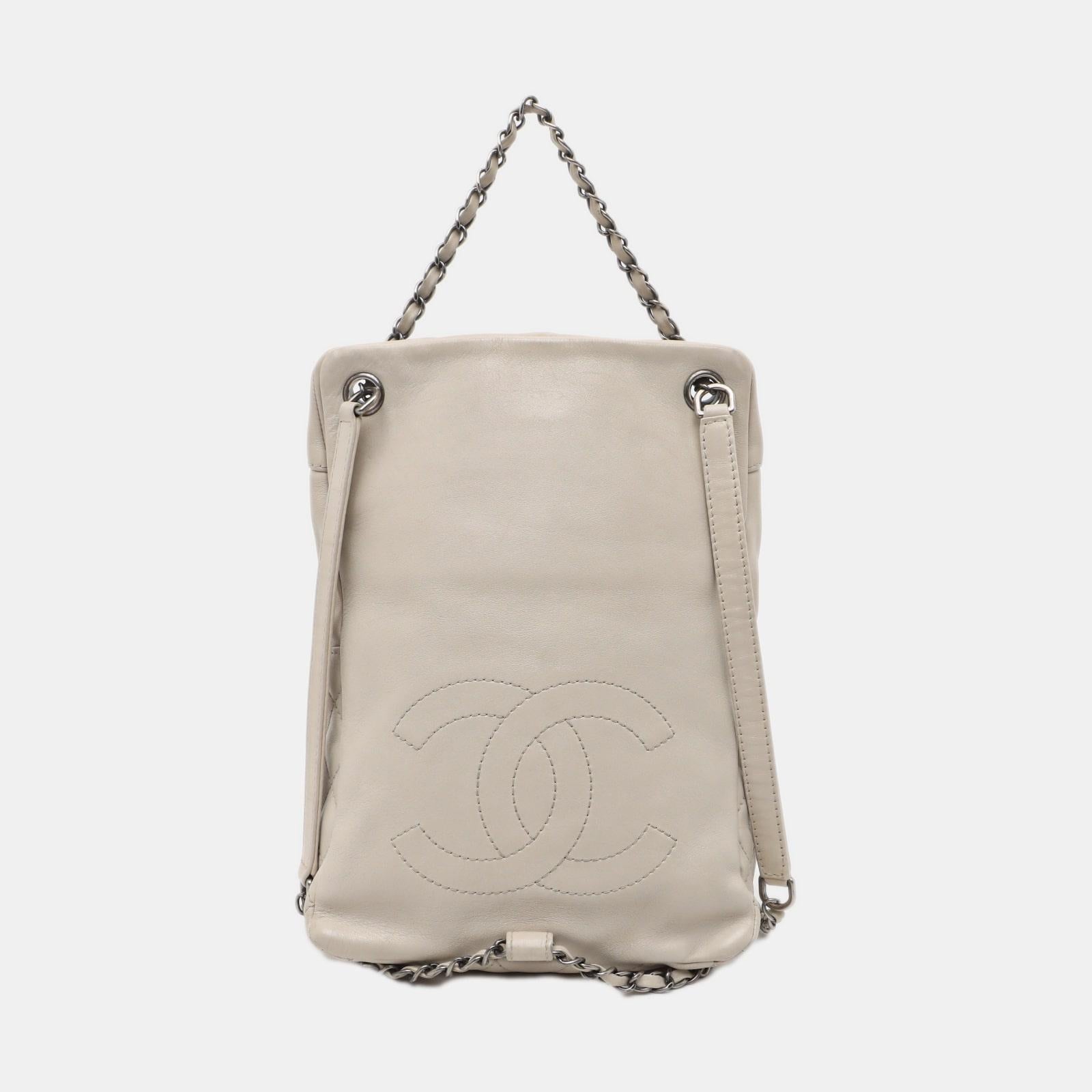 Chanel In Seoul Backpack Chalk White Calfskin Leather, 2015-2016
 These are professional photos of the actual bag.
 CONDITION: VERY GOOD
 Creases and minor scuffs around the corners, bottom, handles and straps. Original condition. Light stains
