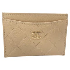 Portacarte Chanel Caviale CC a incastro Beige