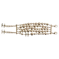 Chanel Interlocking CC Charm Gold-Tone Multi-Strand Beaded Bracelet