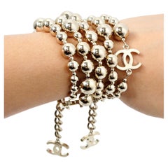 Chanel Interlocking CC Charm Gold-Tone Multi-Strand Beaded Bracelet