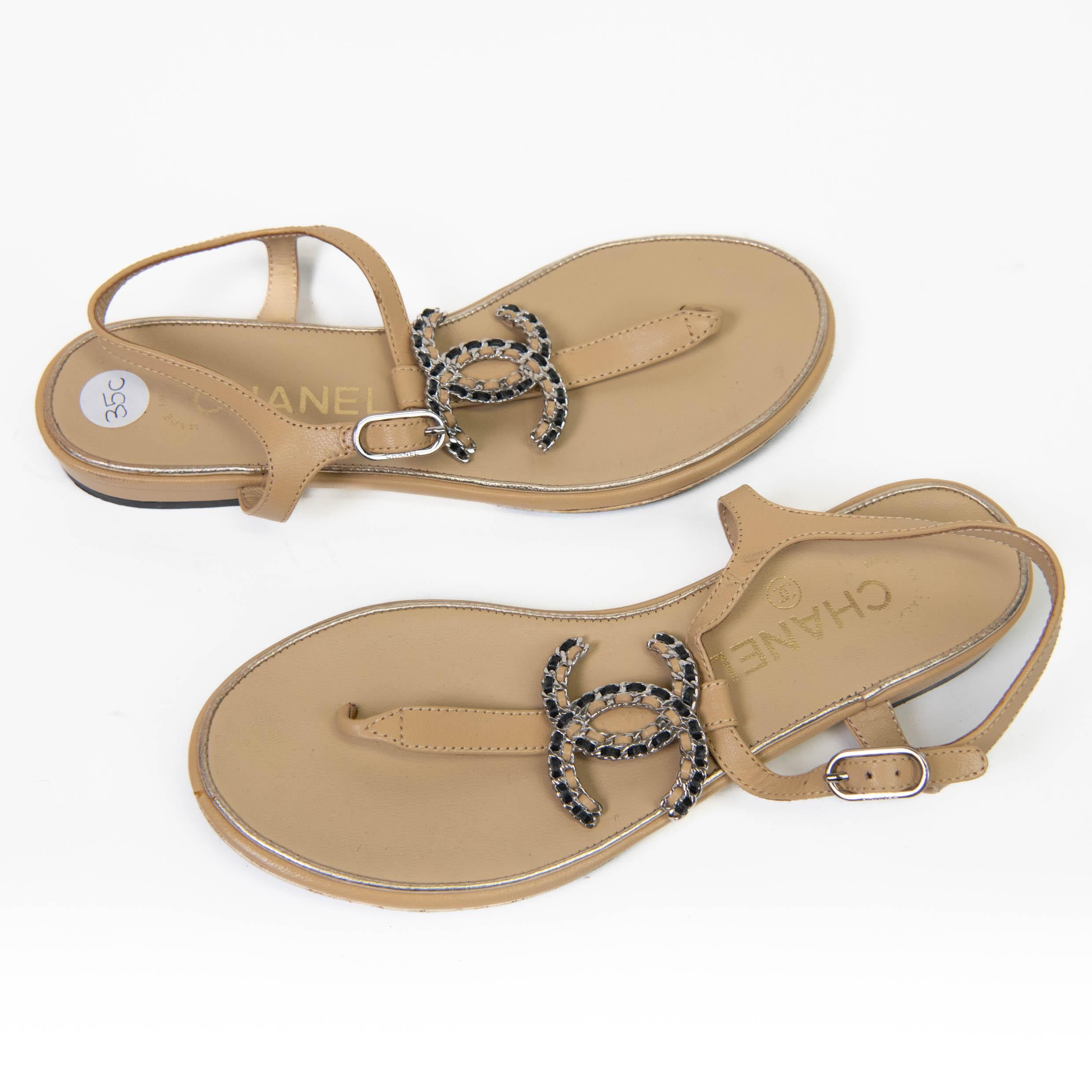 100% Authentic 

Chanel Interlocking CC Logo Beige Leather T-Strap Sandals Size 35c

Excellent Condition

CDT531950

NM2.5.25
One of the most famous fashion and handbag designers of all time, Gabrielle Bonheur “Coco” Chanel opened her first