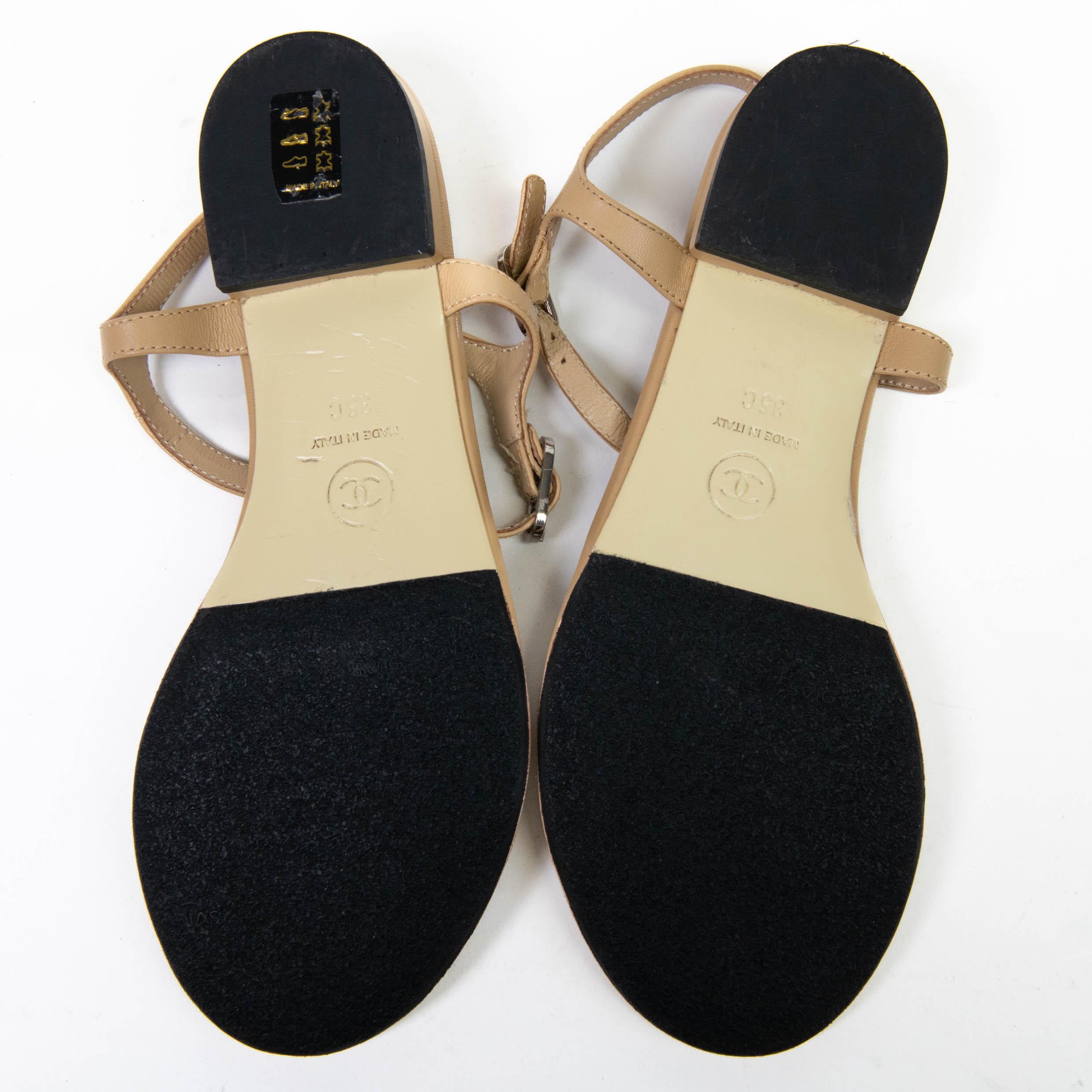 Women's or Men's Chanel Interlocking CC Logo Beige Leather T-Strap Sandals Size 35c For Sale