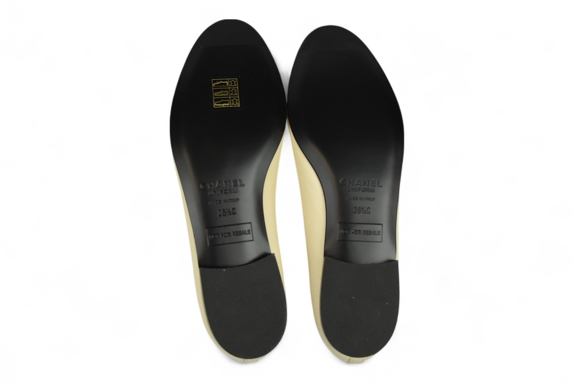 Chanel Yellow & Navy Lambskin Ballet Flats with CC Logo

An iconic blend of Parisian charm and everyday elegance, these Chanel Ballet Flats are crafted from supple lambskin in a soft yellow hue, accented with a navy cap toe. The tonal topstitch CC