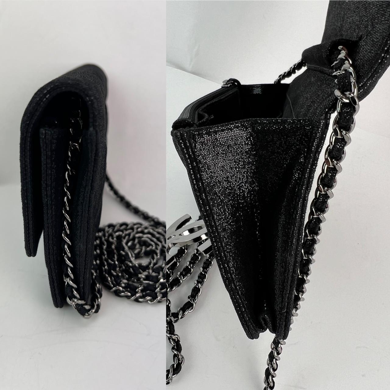 Pre-Owned  100% Authentic
Chanel Iridescent Caviar Crystal Quilted Wallet on a Chain Clutch Bag 
RATING: A...excellent, near mint, has little to no signs of wear
MATERIAL:  luxurious diamond quilted caviar leather
STRAP:black leather woven in silver