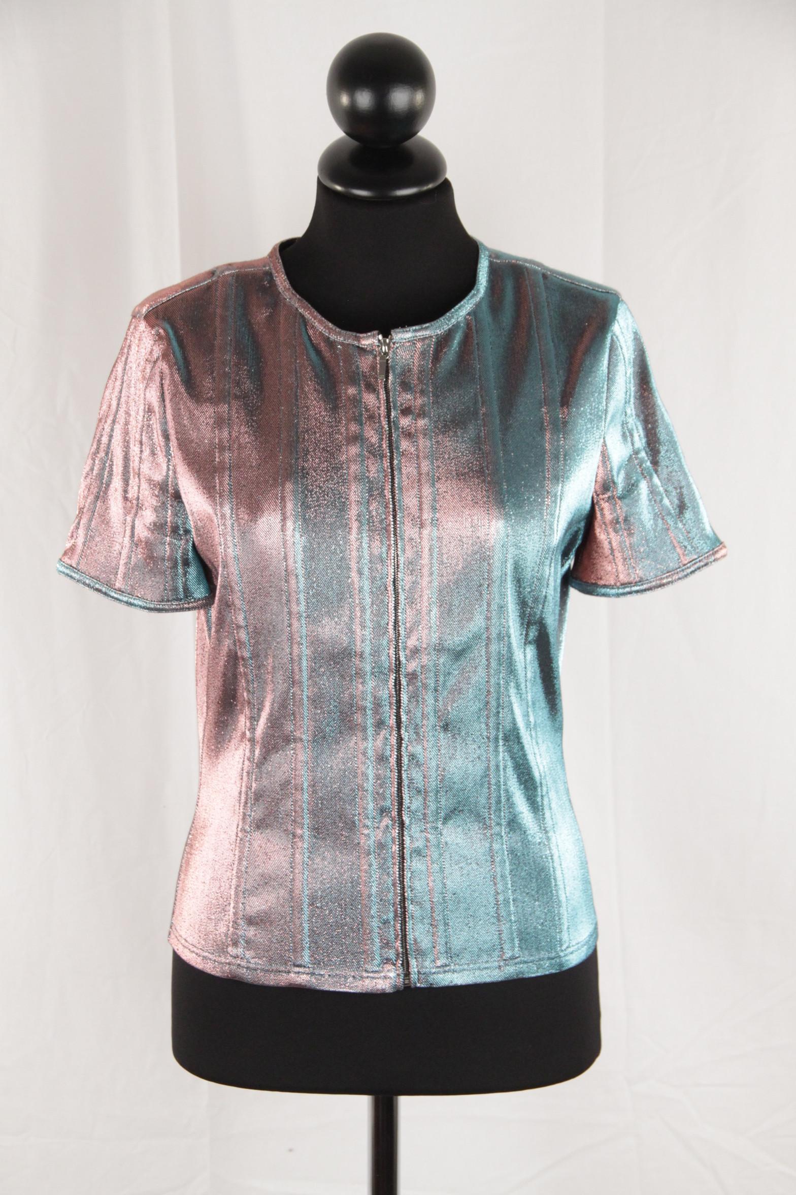 
Chanel Iridescent Changing Lame Short Sleeve Jacket Zip Front Top Size 40

- Short Sleeve styling
- Color: Blue/Pink - Iridescent
- Composition: 41% cotton, 33% nylon, 21% polyester, 5% spandex
- Collarless design
- Unlined
- Front zip closure
-