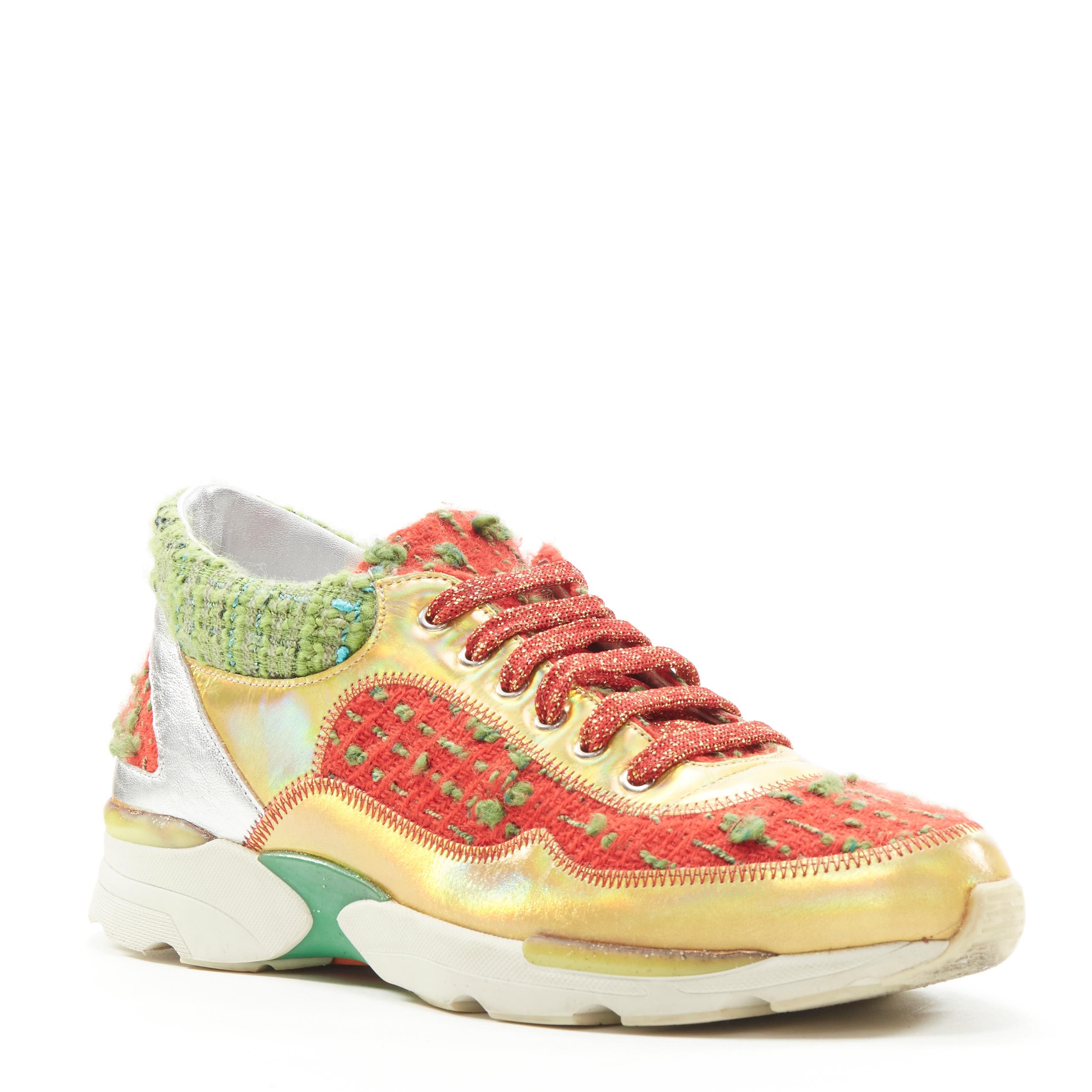 CHANEL iridescent gold red green tweed low top sneaker EU36.5 
Reference: ANWU/A00388 
Brand: Chanel 
Designer: Karl Lagerfeld 
Collection: 2014
Material: Tweed 
Color: Gold 
Pattern: Solid 
Closure: Lurex red laces 
Made in: Italy 


CONDITION: