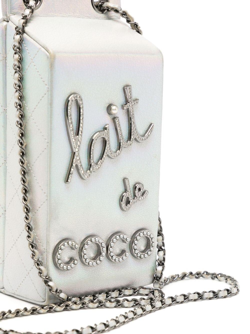 Got milk? This incredibly rare and limited edition Chanel milk carton bag derives from one of Karl Lagerfeld's most infamous runways of all time, the supermarket emporium of autumn/winter 2014. Its iridescent silver leather is detailed with quilted
