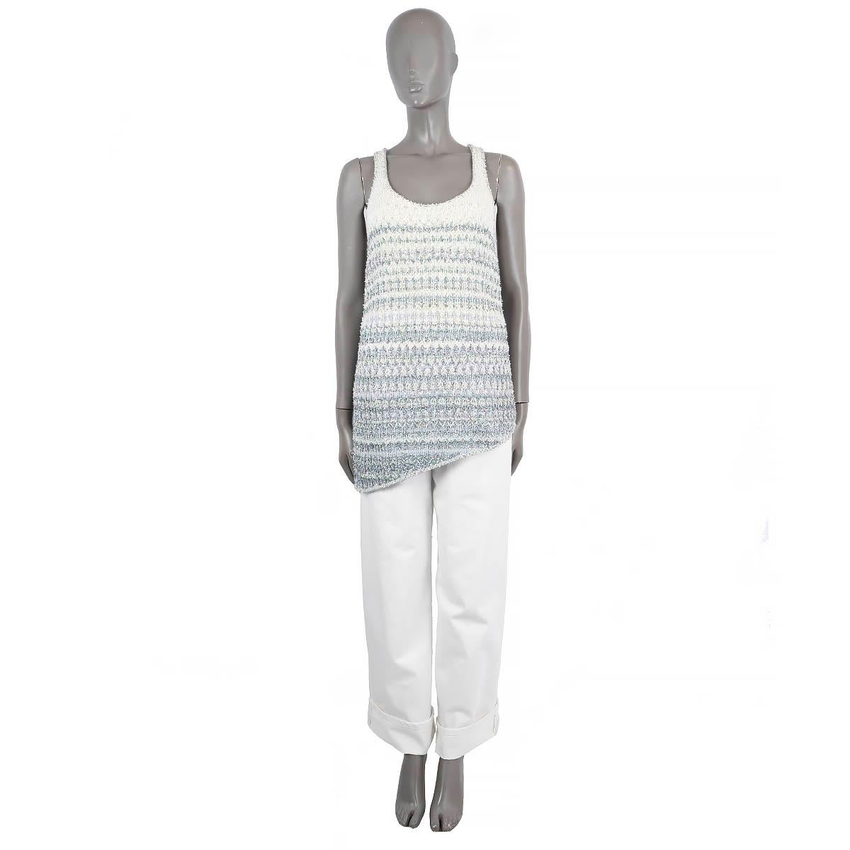 100% authentic Chanel waterfall lurex sleeveless knit top in ivory and blue cashmere (39%), polyamide (27%), cotton (23%), polyester (6%) and silk (5%). Features and asymmetric hem line and scoop neck. Unlined. Has been worn and is in excellent