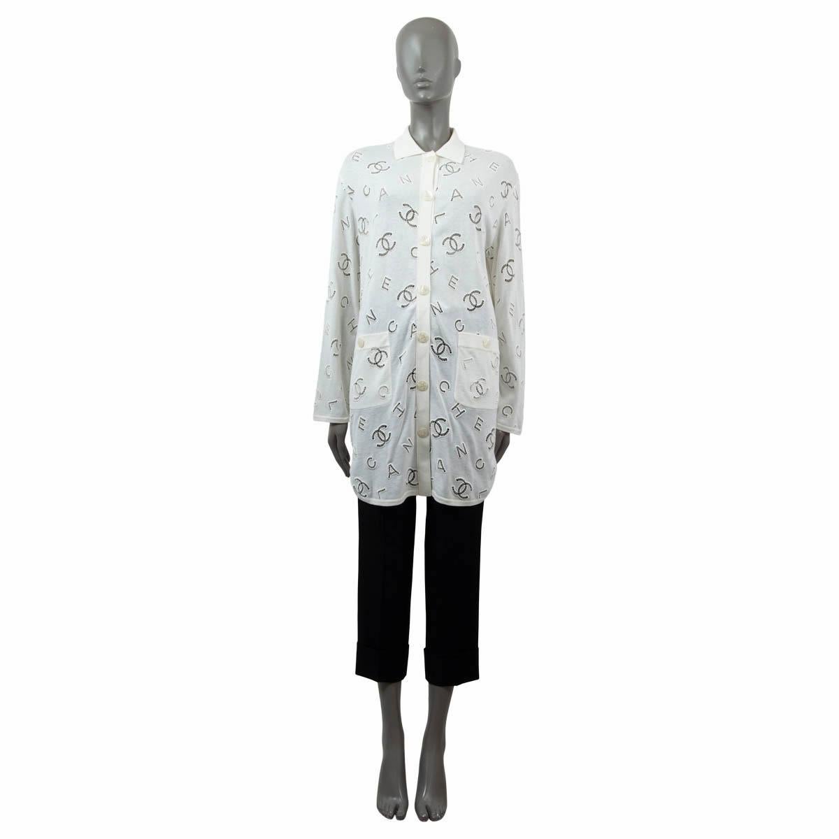 100% authentic Chanel collared oversized long cardigan in ivory cotton (70%) and cashmere (30%). Features logo broderie anglaise embroidery and two patch pockets on the front. Closes with CC mother-of-pearl buttons on the front. Has been worn and is