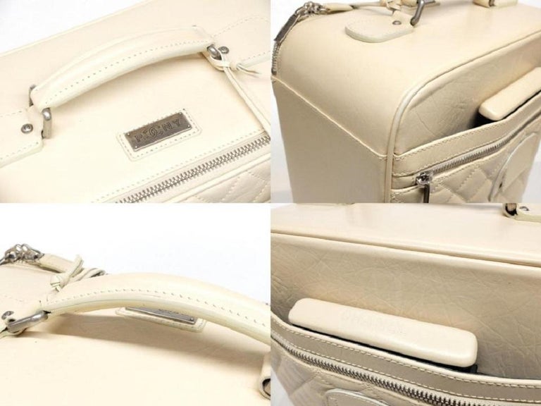 Chanel Ivory Distressed Calfskin Leather Rolling Luggage Carry-On
