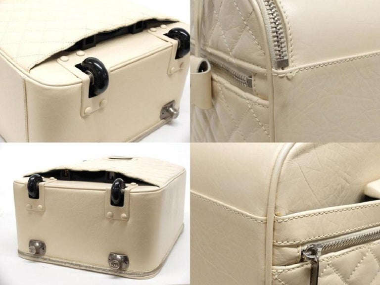 Chanel Ivory Distressed Calfskin Leather Rolling Luggage Carry-On