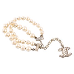 Bracciale CC Chanel avorio con perle finte grandi