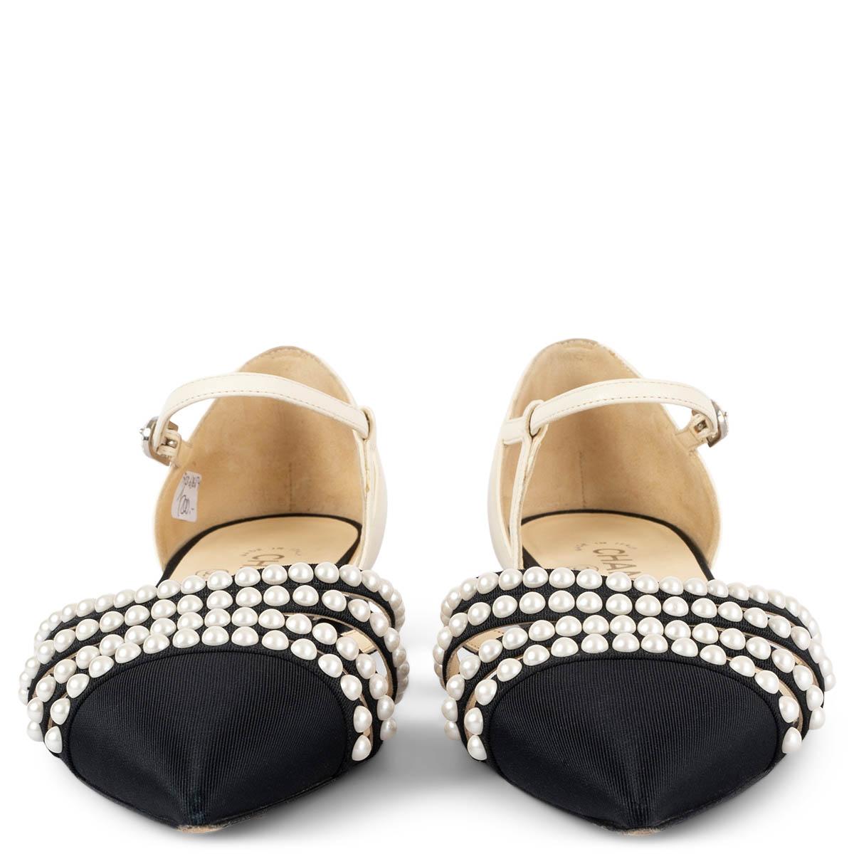100% authentic Chanel pearl embellished pointed-toe ankle-strap flats in black grosgrain and ivory leather. Have been worn and are in excellent condition. 

2016 Paris-Rome Metiers d'Art

Measurements
Model	Chanel16A G31892
Imprinted Size	38.5
Shoe