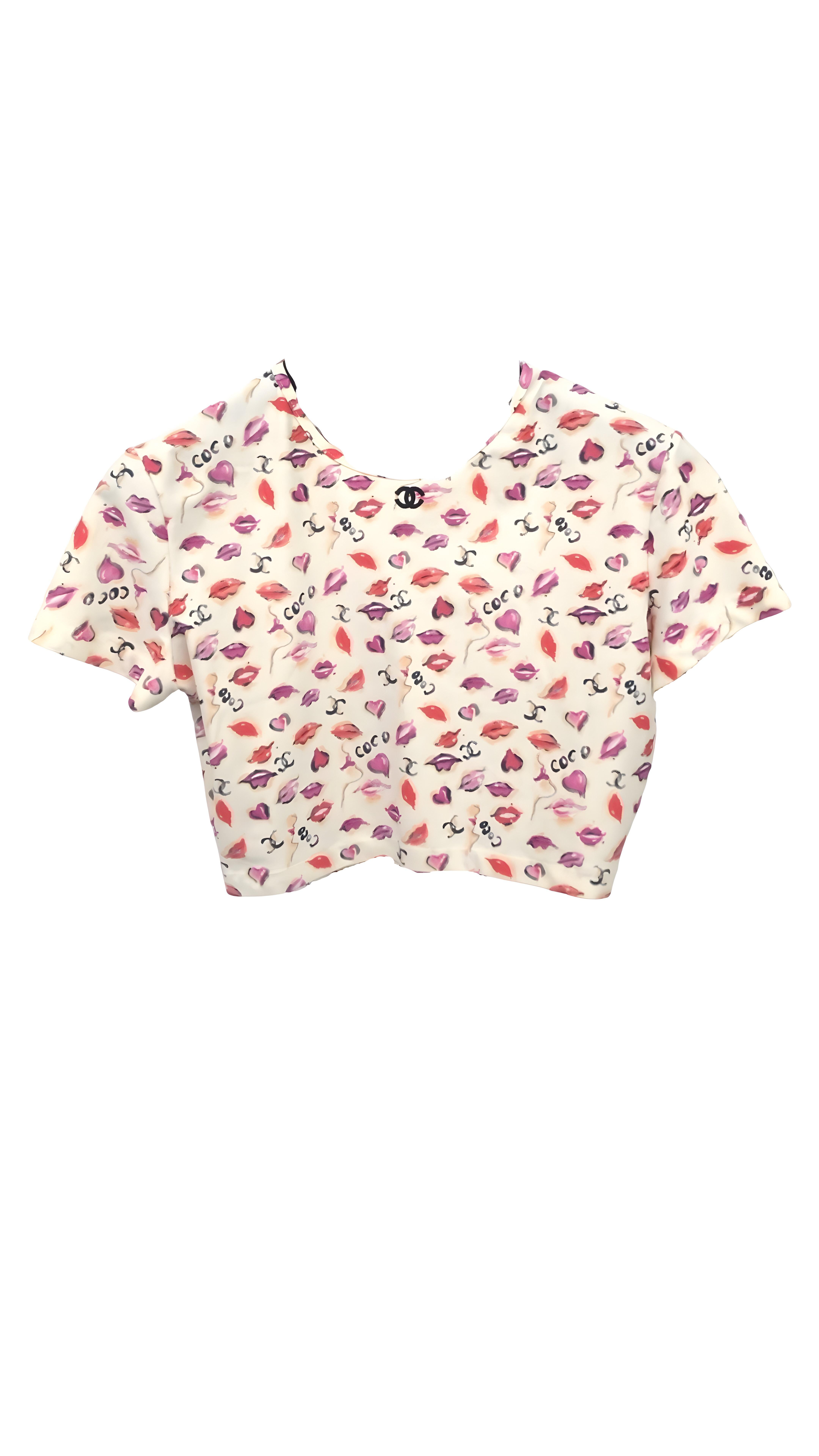 - Chanel ivory/white throughout print of lips, hearts, and iconic interlocking CC logo and cut it in cropped silhouette from spring 1995 collection. 

- Size 44. 

- Shoulder Width : 13.8 