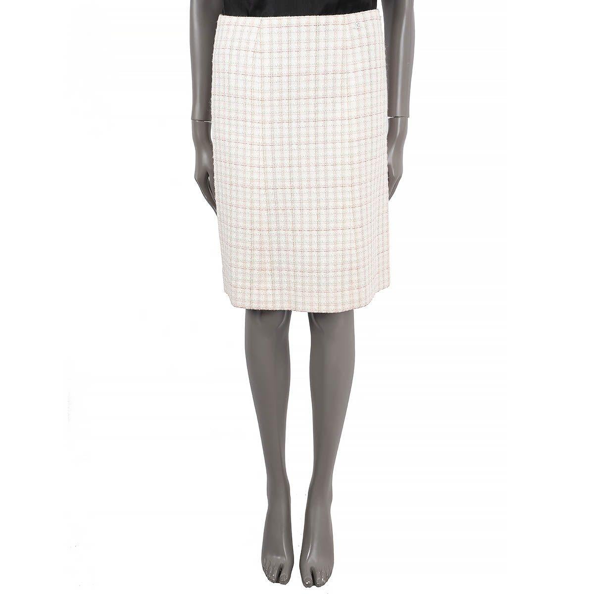 100% authentic Chanel straight tweed skirt in ivory, pink, red and mint green wool (36%), nylon (34%), viscose (16%) and cotton (14%). Closes with one hook and a invisible zipper on the back. Lined in ivory silk (95%) and spandex (5%). Has been worn
