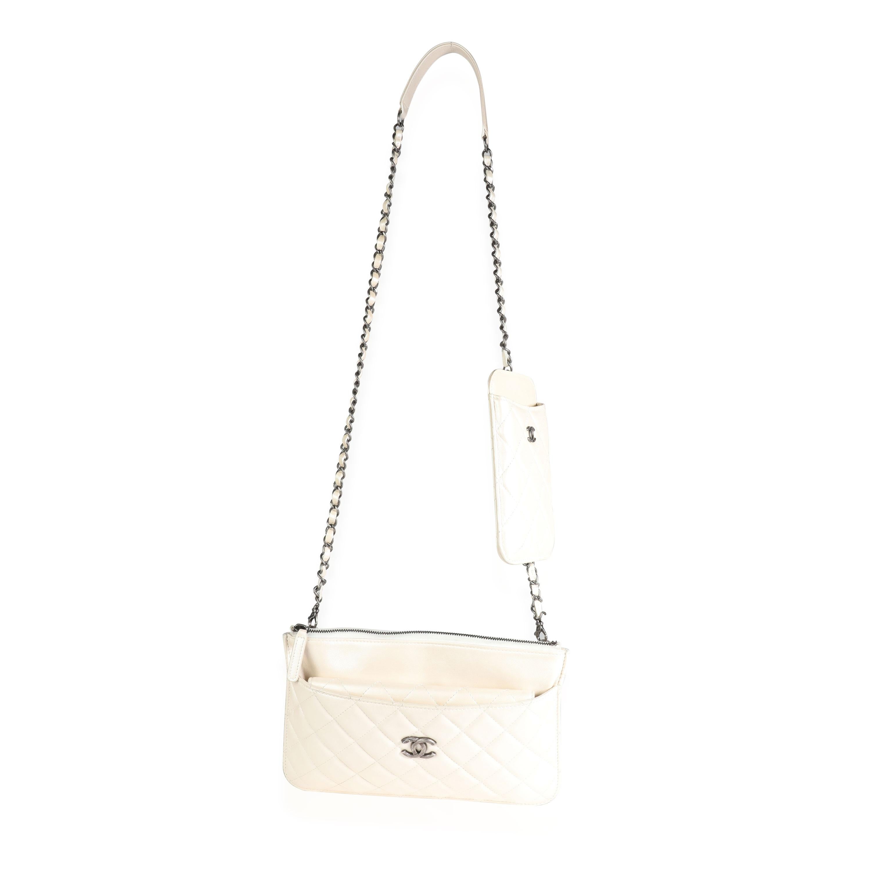 Listing Title: Chanel Ivory Quilted Lambskin Bag In A Bag
SKU: 117442
Condition: Pre-owned (3000)
Handbag Condition: Very Good
Condition Comments: Very Good Condition. Wear to corners. Fleabites to exterior. Faint scuffing throughout.
Brand: