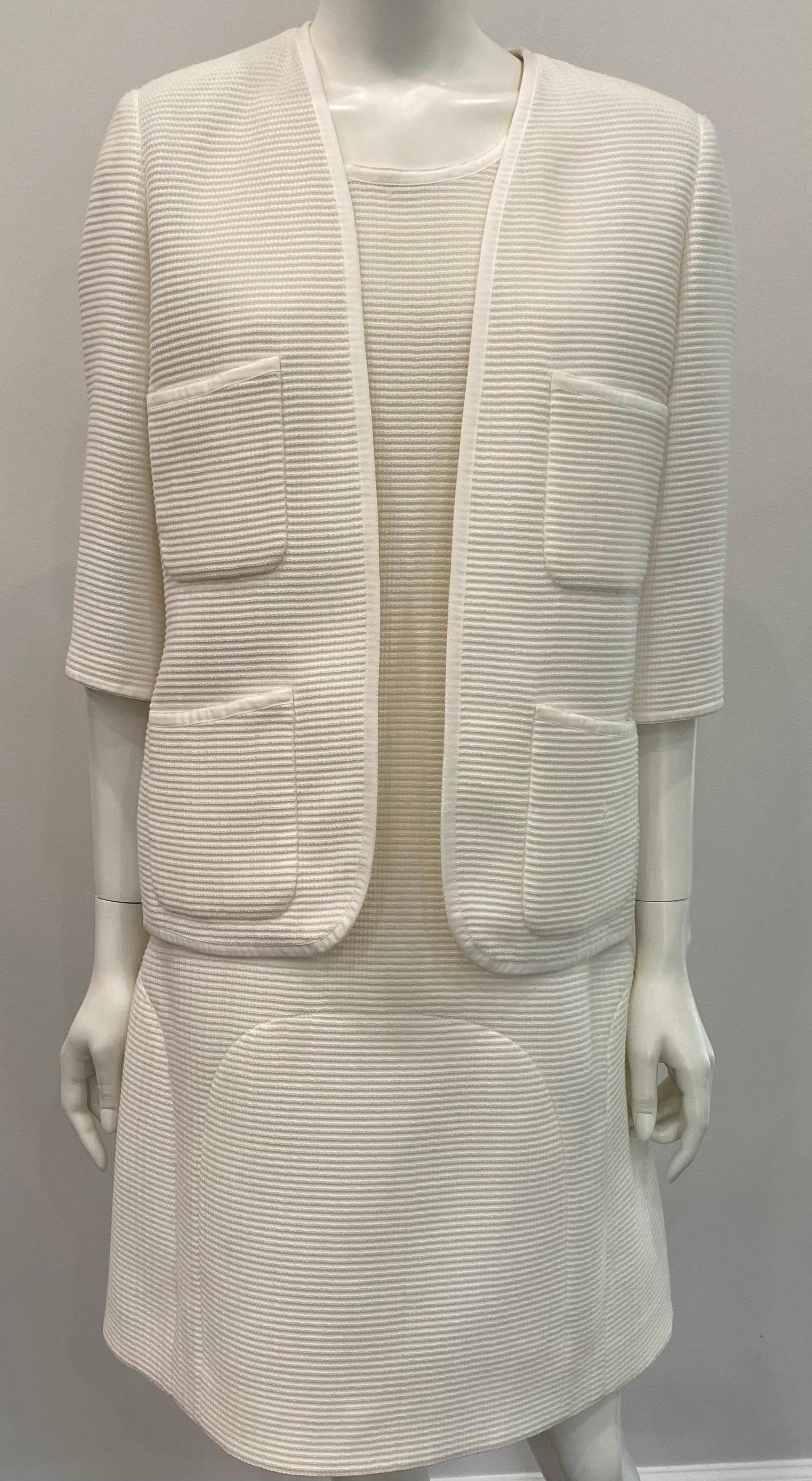 Chanel Ivory Ribbed Cotton Sleeveless Sheath Dress with Jacket - Sz 42. This two piece ensemble is a very elegant, simple and versatile creation as you can mix these items with others in your wardrobe. Both cotton ribbed pieces are fully lined in a