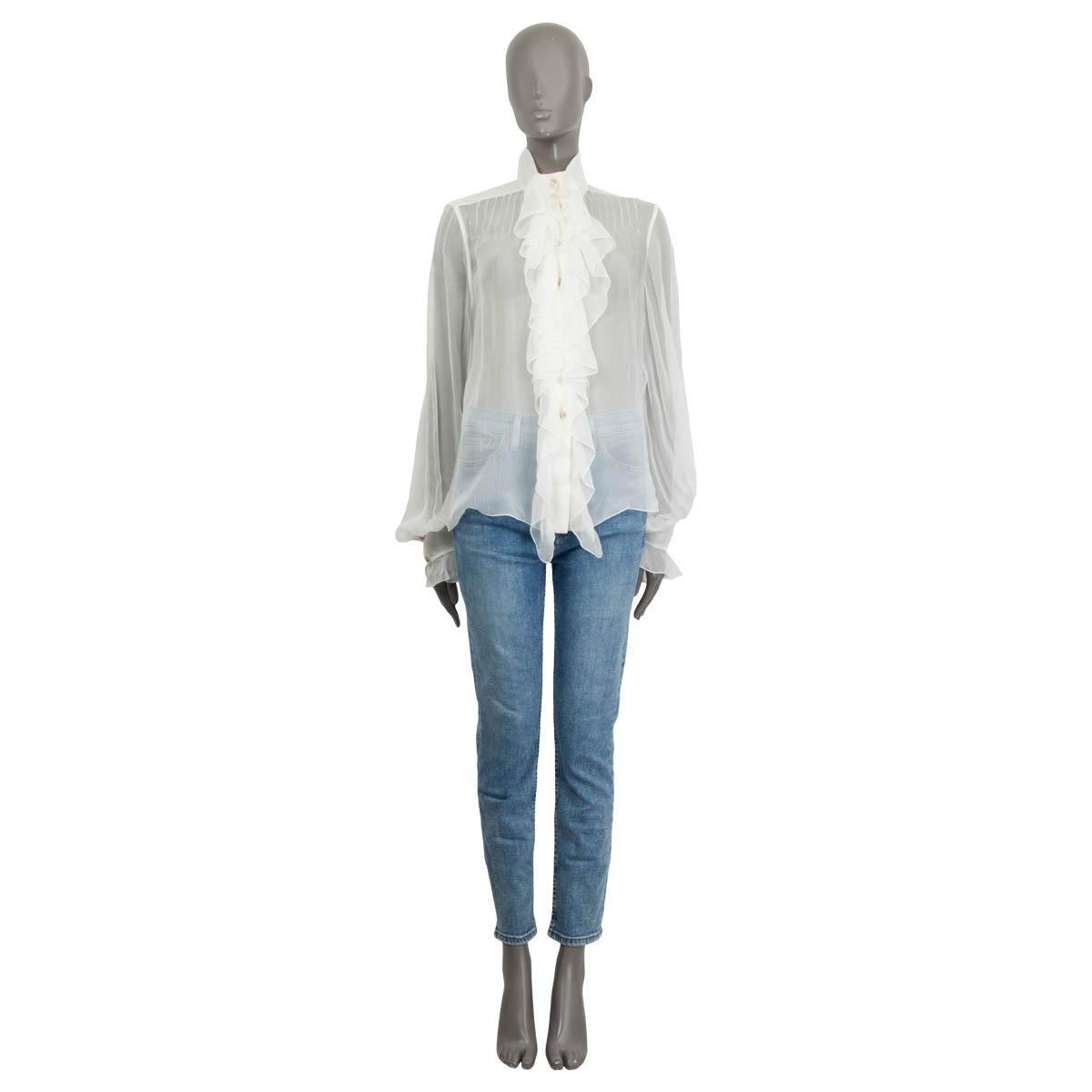 100% authentic Chanel sailor collar blouse in ivory silk (100%). Spring/summer 2018 collection. Blouse features two chest pockets at front, padded and quilted shoulder detail and sheer chantilly lace trimming on the sleeves and around the sailor