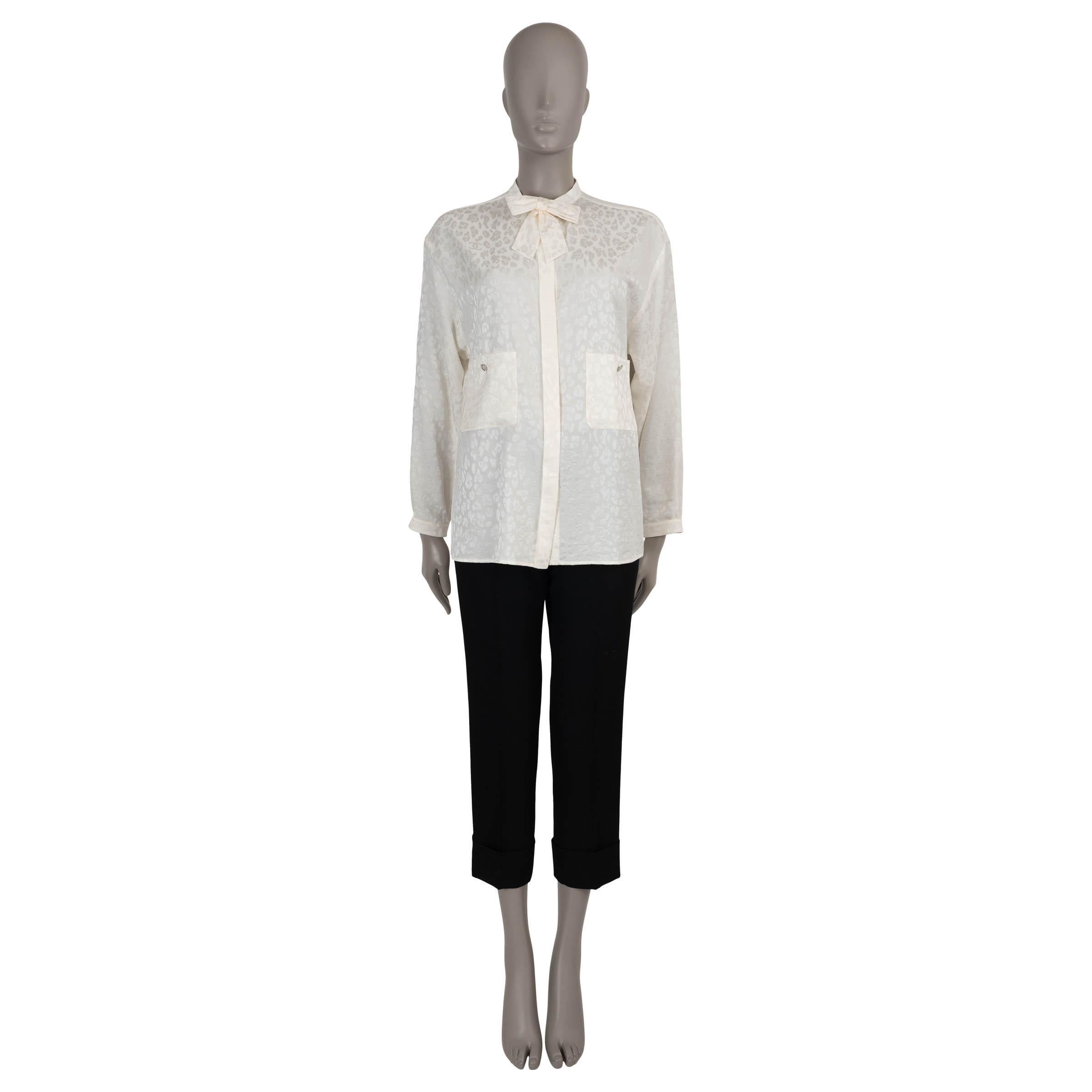 Women's CHANEL ivory silk 23A DAKAR LEOPARD JACQUARD BOW Shirt 40 M For Sale
