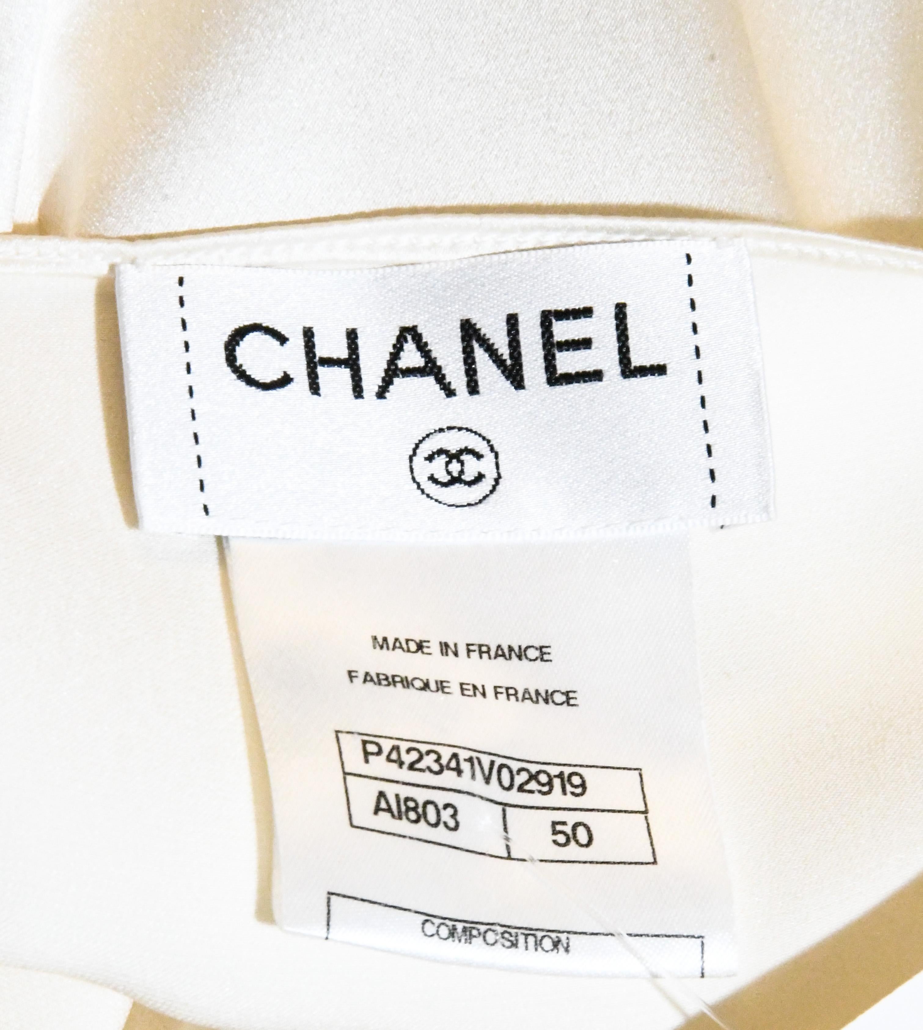 Chanel Ivory Silk Cap Sleeve  Top With Chanel Crystal Button at Back 50 For Sale 1