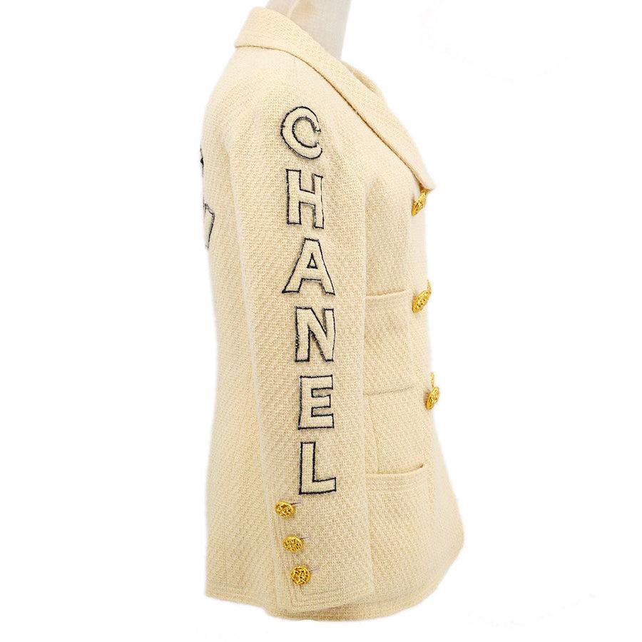 CHANEL Tweed marfil  Chaqueta blazer negra con logotipo 