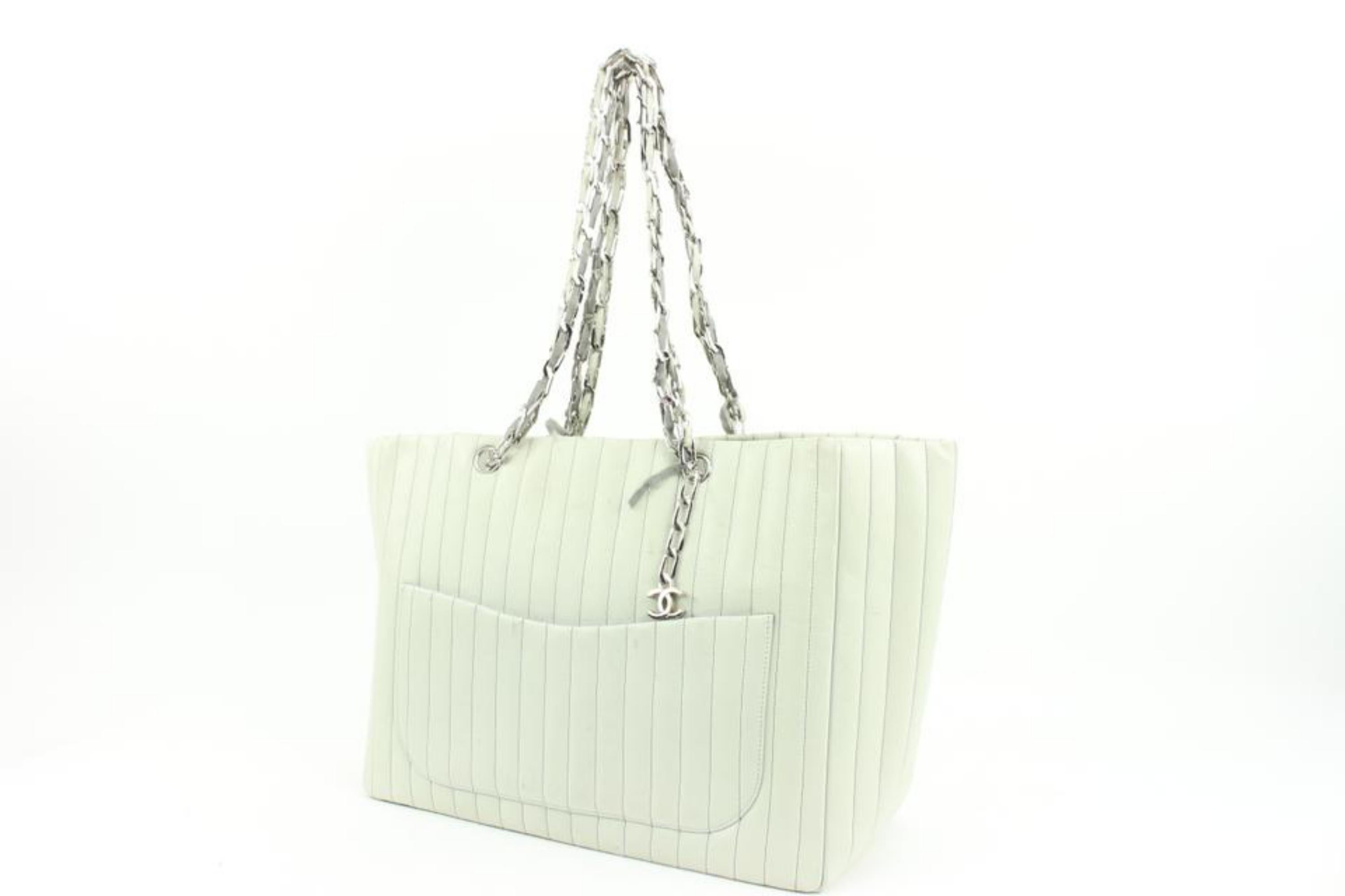Chanel Ivory Vertical Quilted Lambskin Secret Label Chain Tote 20ca127s
Date Code/Serial Number: 10273708
Made In: Italy
Measurements: Length:  19