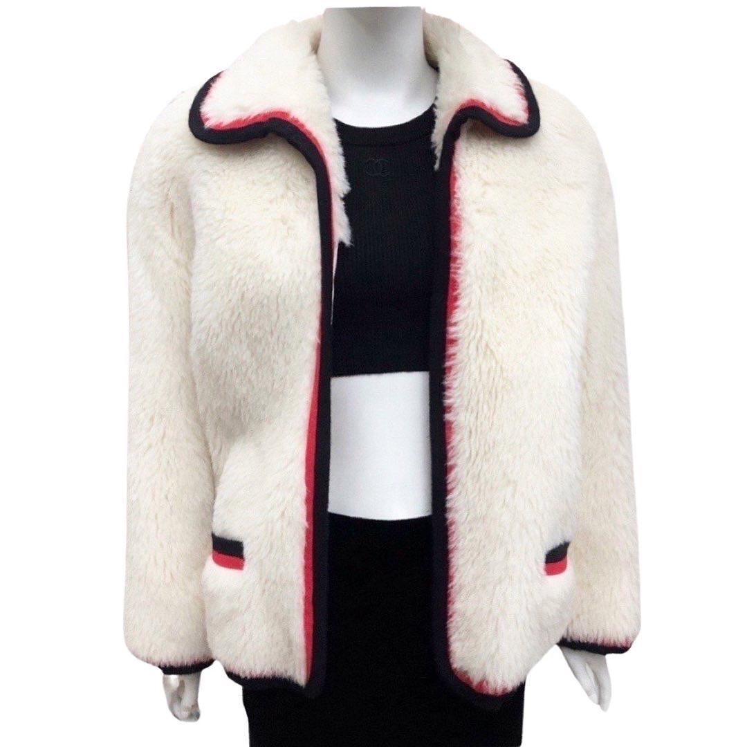 red coat with white fur trim