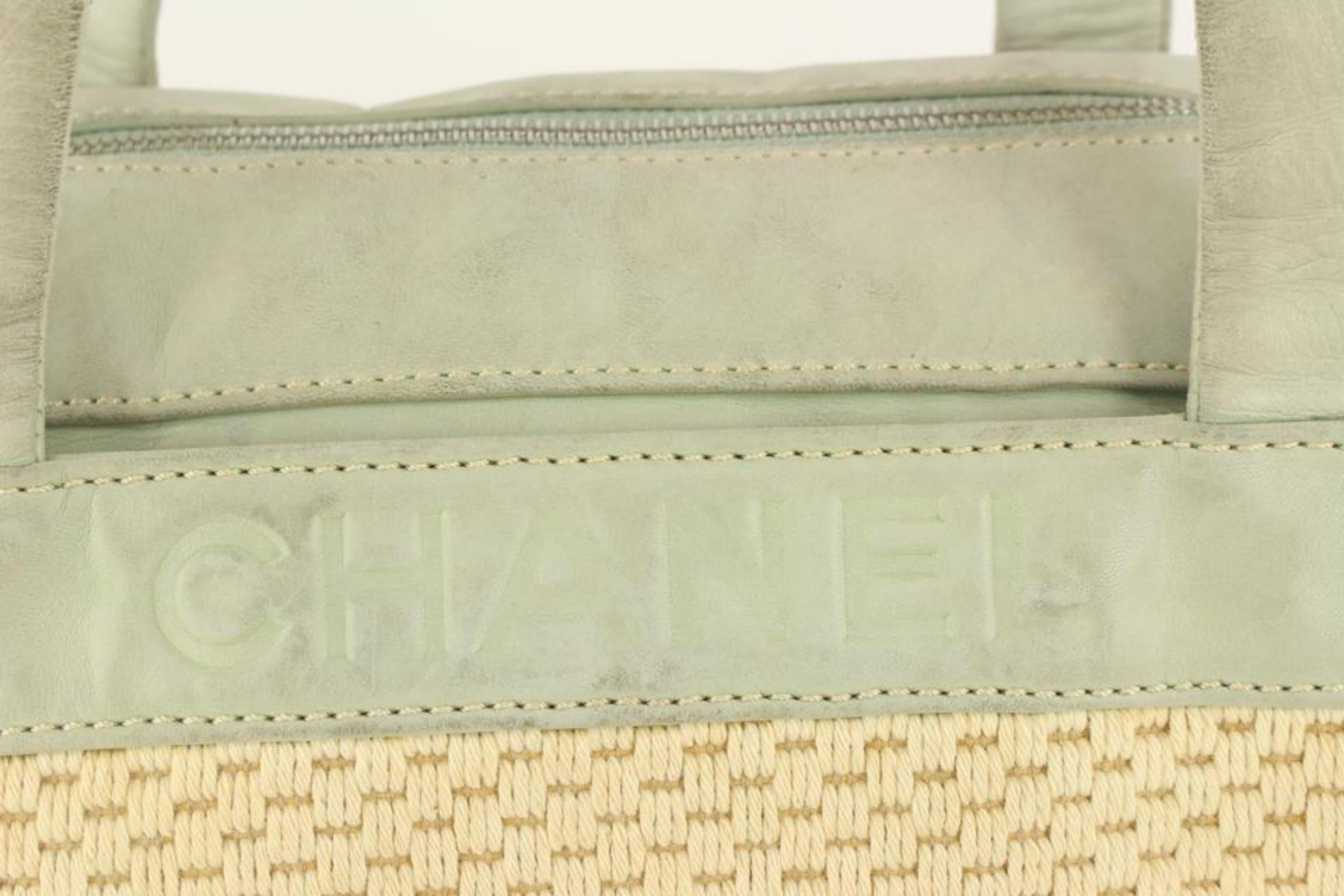 Chanel Ivory x Green Woven Fabric x Leather Boston Shoulder Bag 1115c7
Date Code/Serial Number: 9834987
Made In: Italy
Measurements: Length:  15
