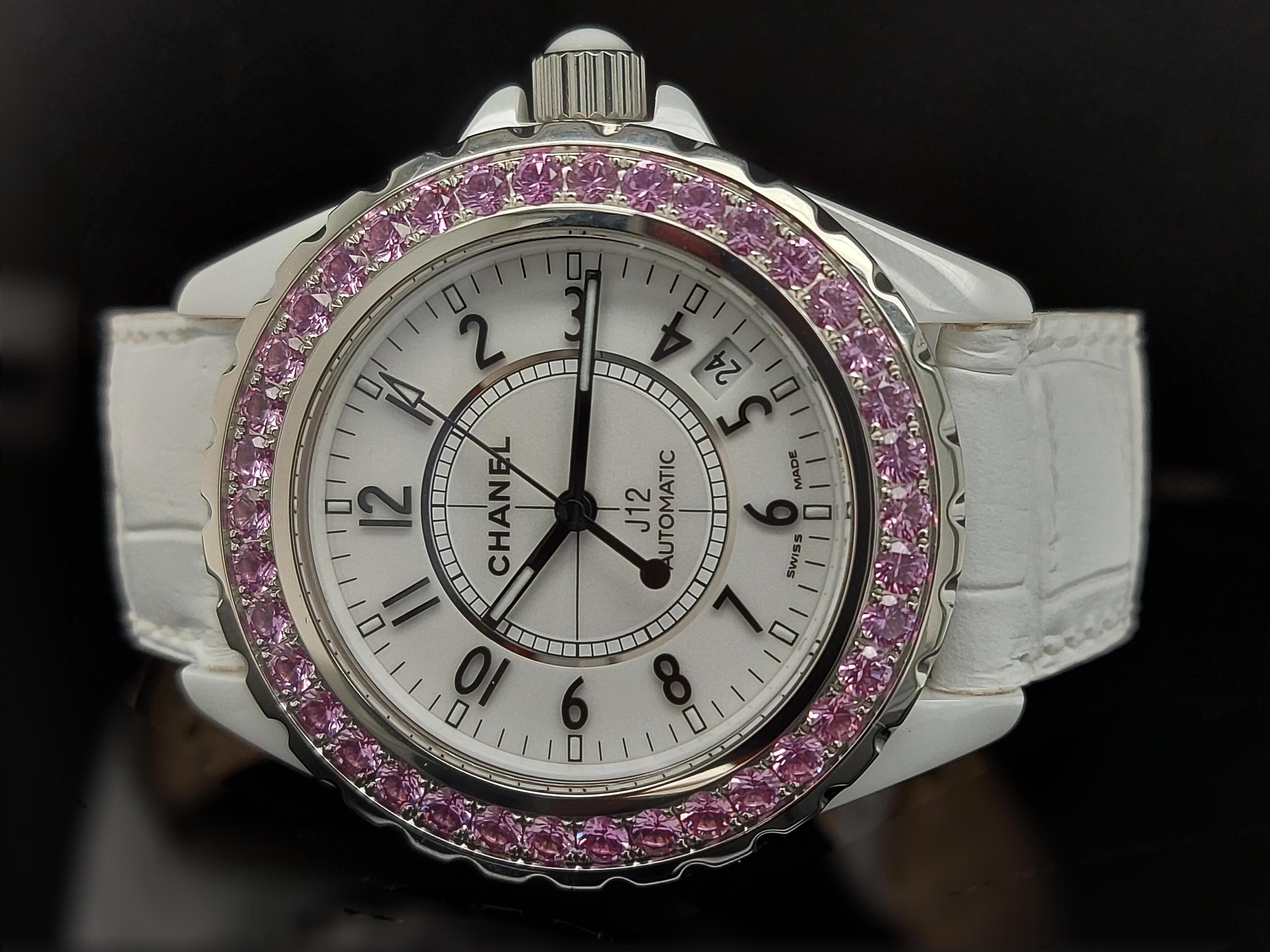 Chanel J12, Automatic, Ceramic 38 mm case, With pink sapphires

Reference: H1182

Model: Chanel J12

Movement: Automatic

Functions: Hours, Minutes, Seconds, Date window between 4 and 5 o'clock

Case: Ceramic, Steel bezel, diameter 38 mm, thickness