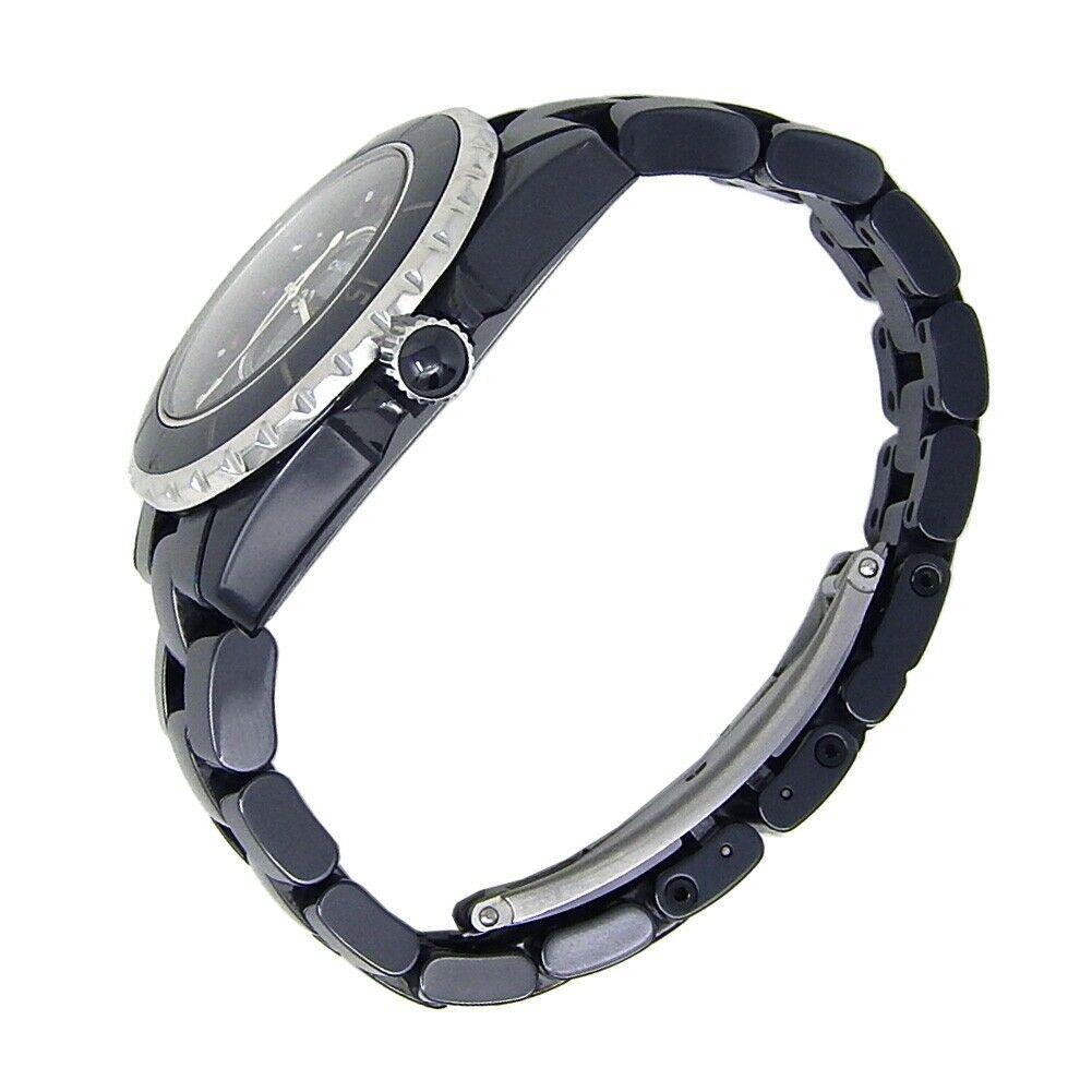 Brand: Chanel
Band Color: Black	
Gender:	Women's
Case Size: 32-35.5mm	
MPN: Does Not Apply
Lug Width: 16mm	
Features:	Date Indicator, Diamond Dial, Luminous Dial, Luminous Hands, Non-Numeric Hour Marks, Rotating Bezel, Sapphire Crystal, Screwdown