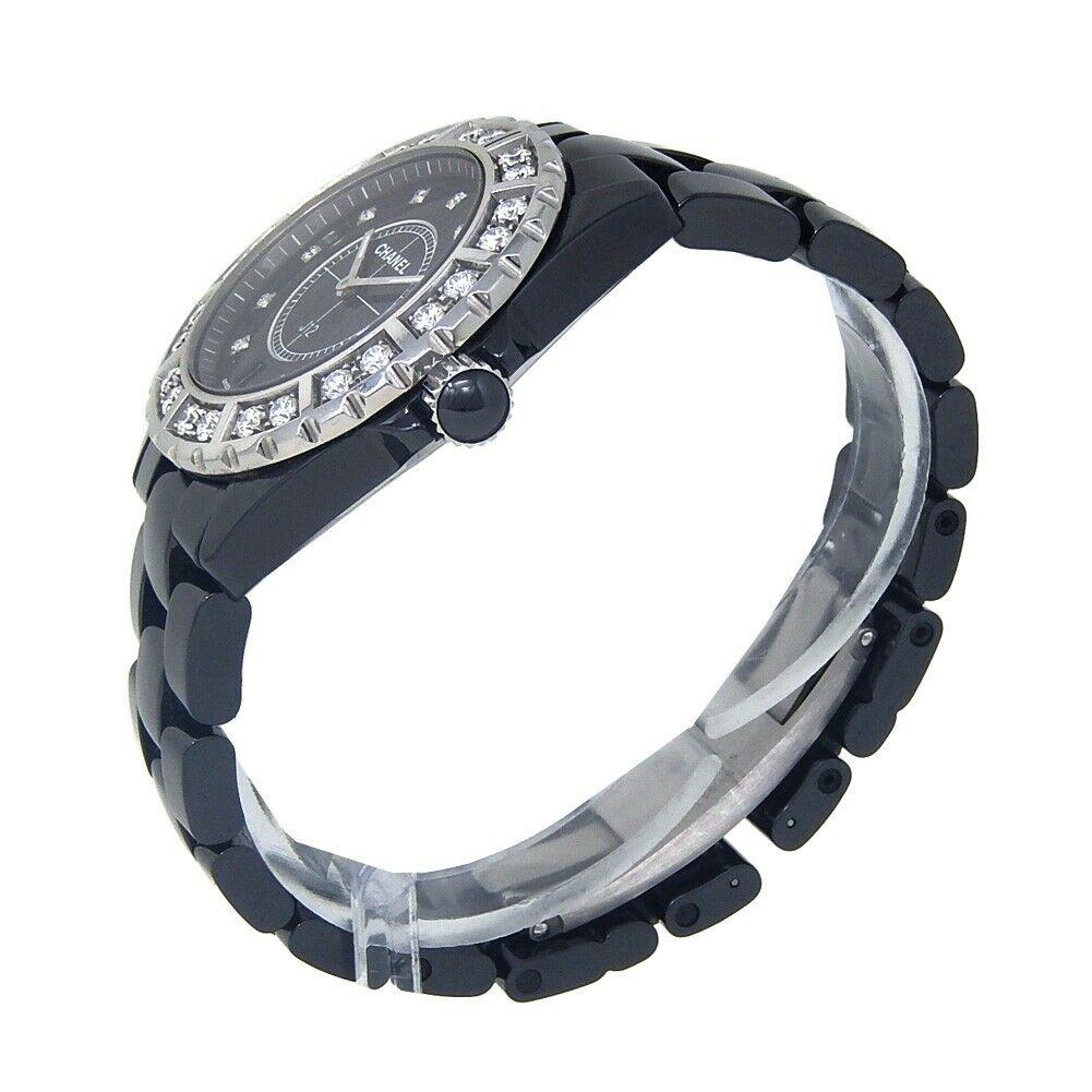 Brand: Chanel
Band Color: Black	
Gender:	Women's
Case Size: 36-39.5mm	
MPN: Does Not Apply
Lug Width: 19mm	
Features:	12-Hour Dial, Date Indicator, Diamond Bezel, Diamond Dial, Luminous Hands, No Hour Marks, No Second Hand, Sapphire Crystal, Swiss
