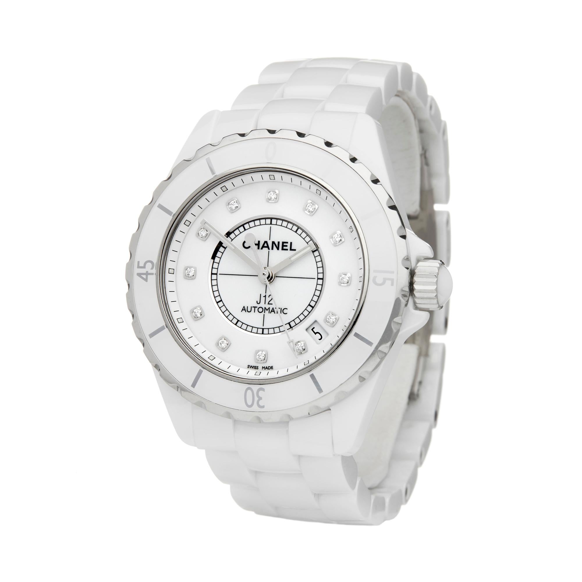 Reference: COM2136
Manufacture: Chanel
Model: J12
Model Reference: H1629
Age: 7th August 2015
Gender: Women's
Box and Papers: Box, Manuals and Guarantee
Dial: White Diamond
Glass: Sapphire Crystal
Movement: Automatic
Water Resistance: To