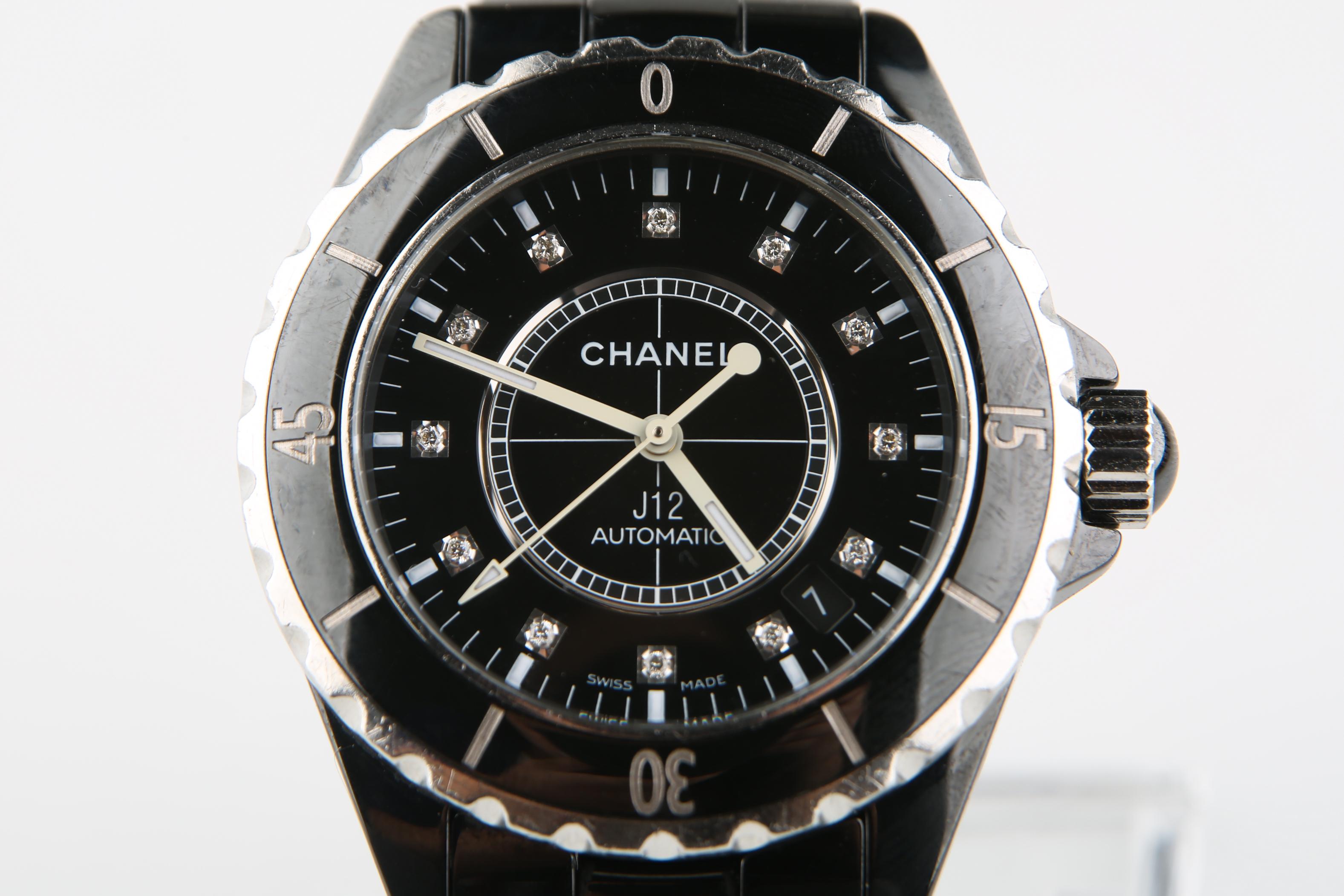 Model: J12 Classic Automatic
Model number: H0685
Serial number: LN85848
Black Chanel Stainless Steel Case w/ Diver's Bezel
Unidirectional Black Enamel Diver's Bezel
Chanel Automatic Self-Winding Mechanical Movement
38 mm in Diameter (42 mm w/