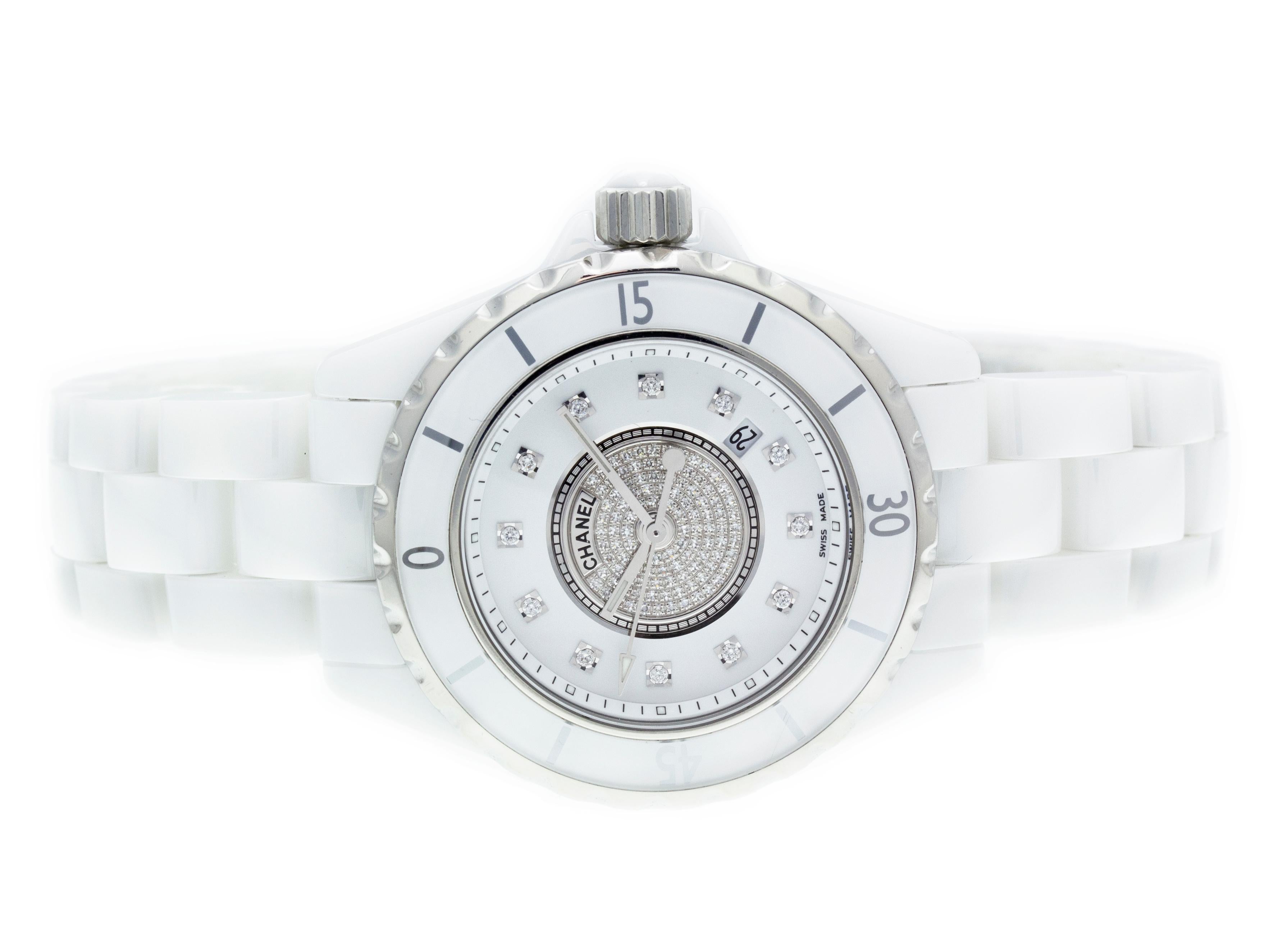 Chanel J12 H2123 white ceramic bracelet watch, with white pave diamond dial w/ diamond hour markers, water resistance to 200m, with date.

Watch	
Brand:	Chanel
Series:	J12
Model #:	H2123
Gender:	Ladies
Condition:	Great Display Model, Tiny Dings &