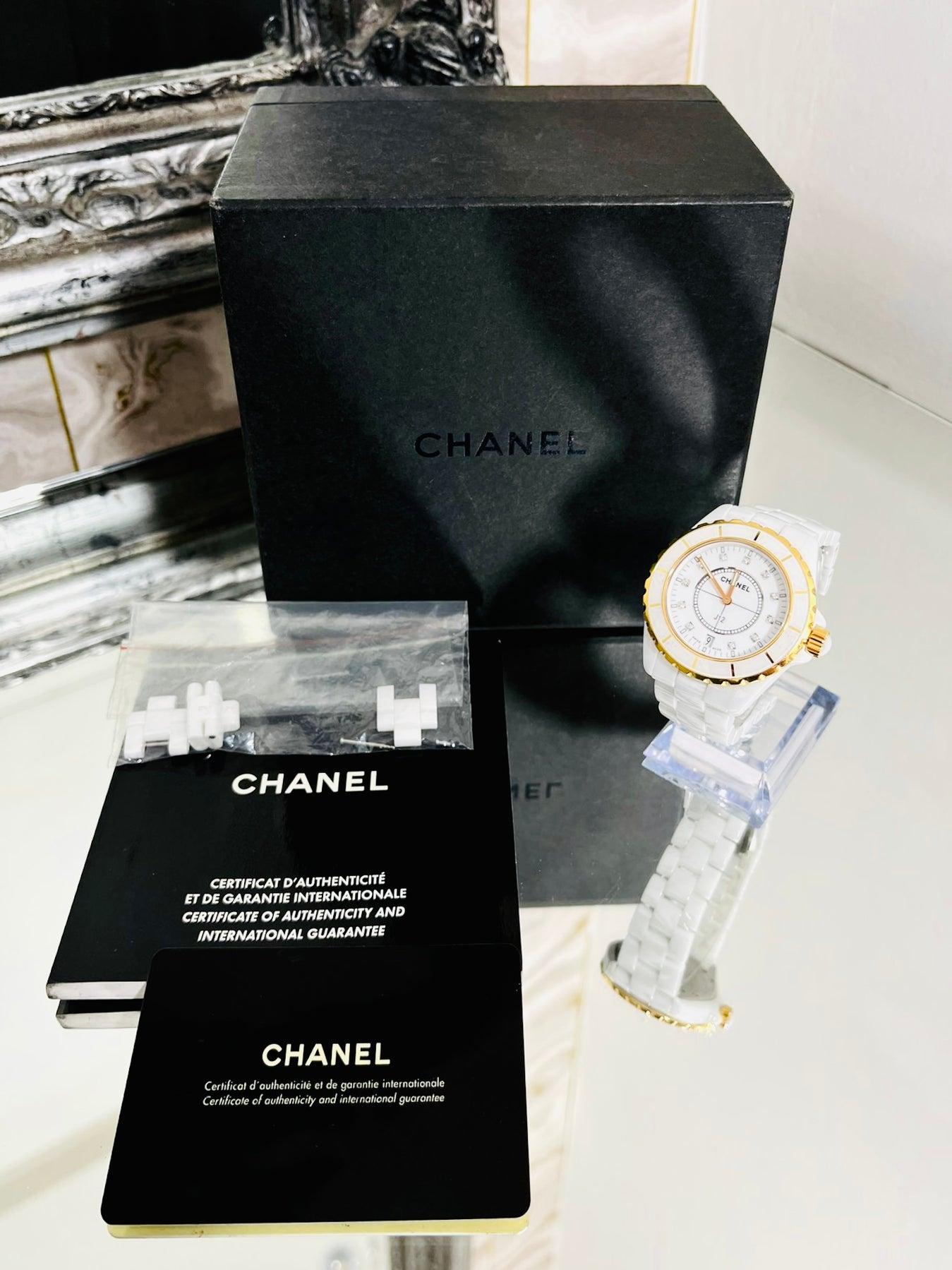Chanel J12 Watch 18k Rose Gold, Diamond & Ceramic

White ceramic watch, with gold trim and diamond dot dials. Quartz movement, folding clasp closure.

Additional information:
Size- 38mm
Composition- 18k Gold, Diamonds, Ceramic
Condition - Very Good