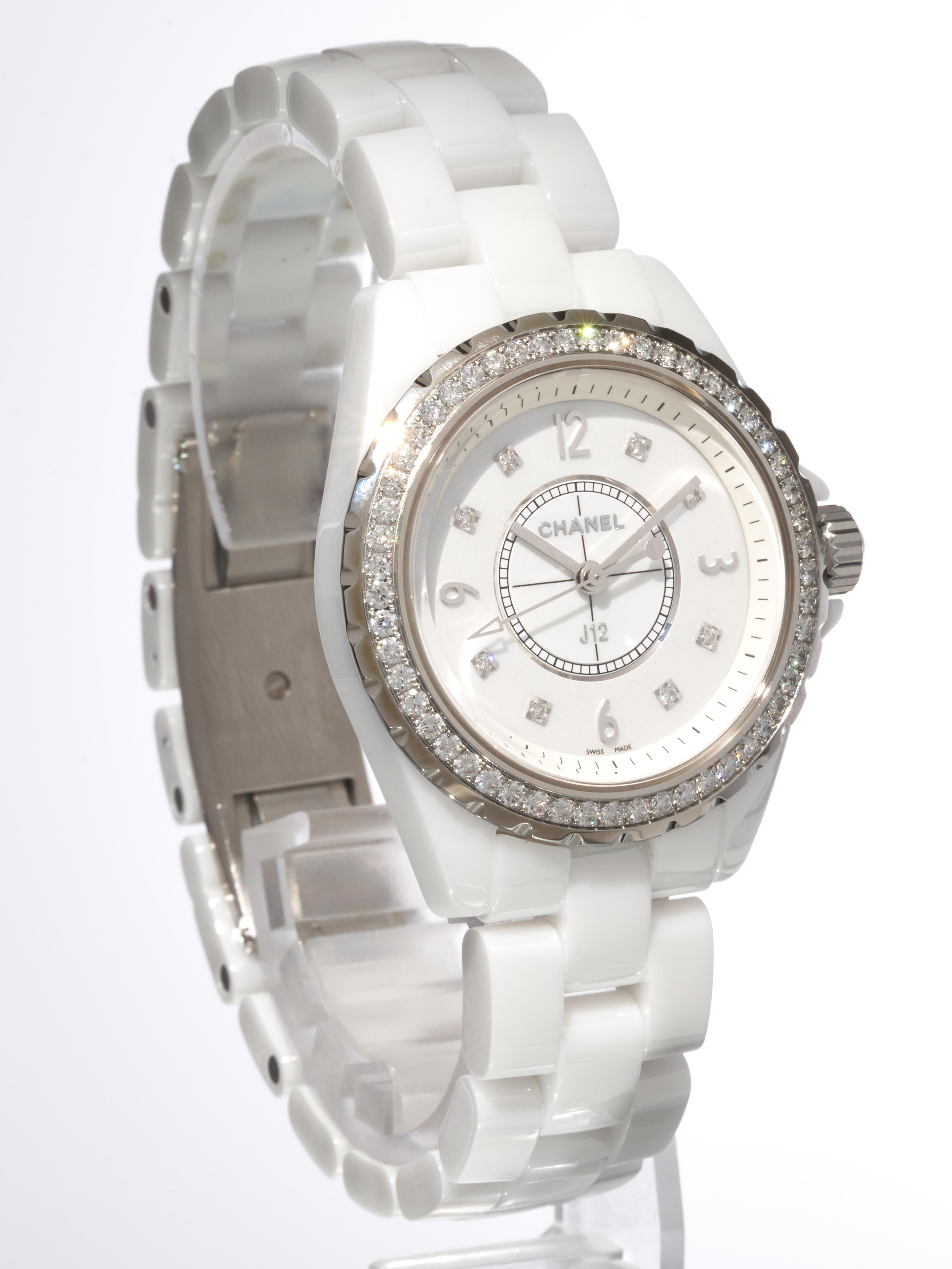 Fork In Time is proud to offer on the 1st Dibs marketplace:

Chanel 
J12 
White Ceramic

Diamond Bezel with Diamond Dial Markers
53 Diamonds around the Bezel [approx 1.5Carats] - 8 Diamonds on the Dial [Approx 0.1 Carats]

33mm Case Size

Quartz